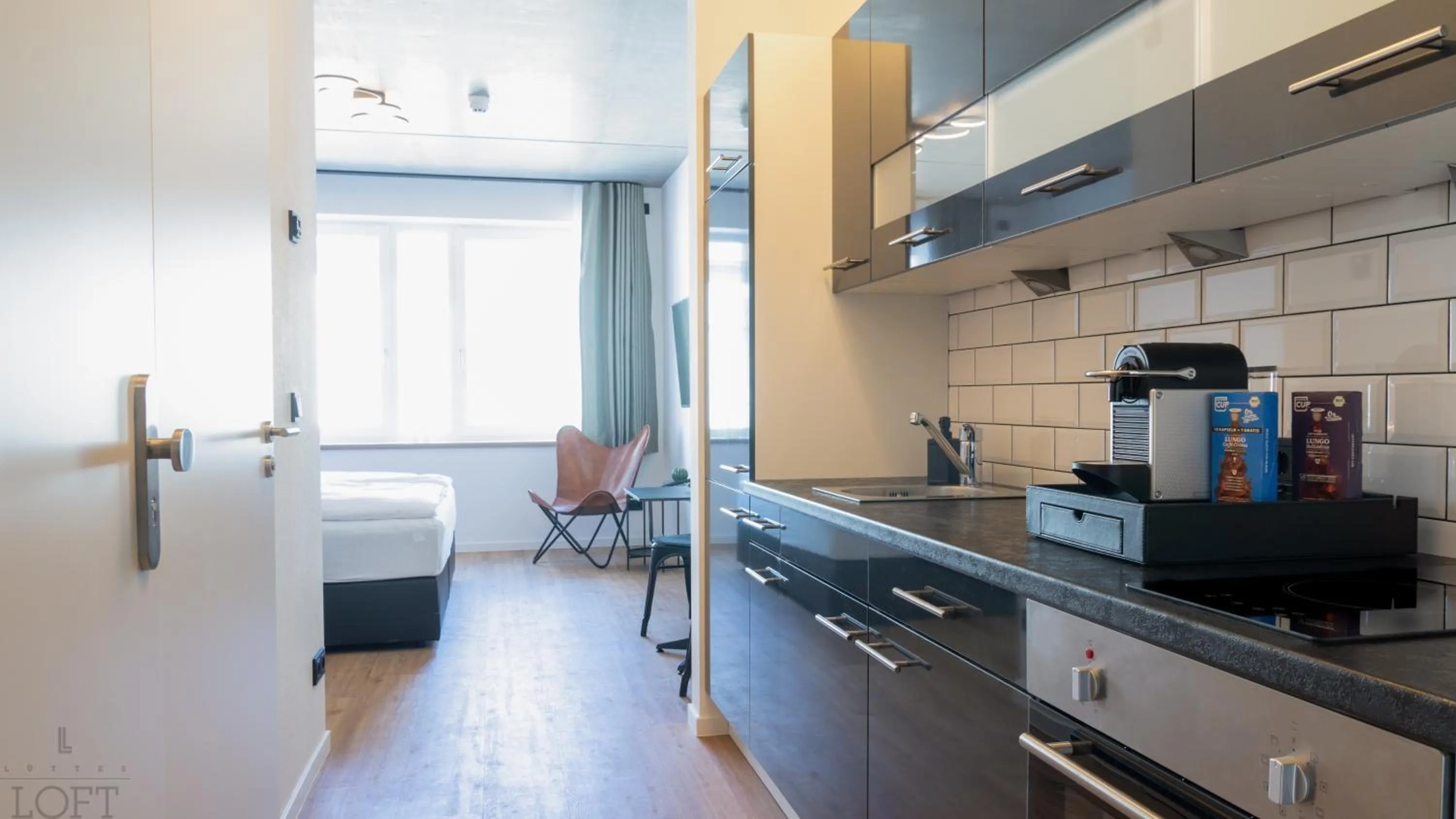 Kitchen or kitchenette in LÜTTES LOFT Boutique Hotel