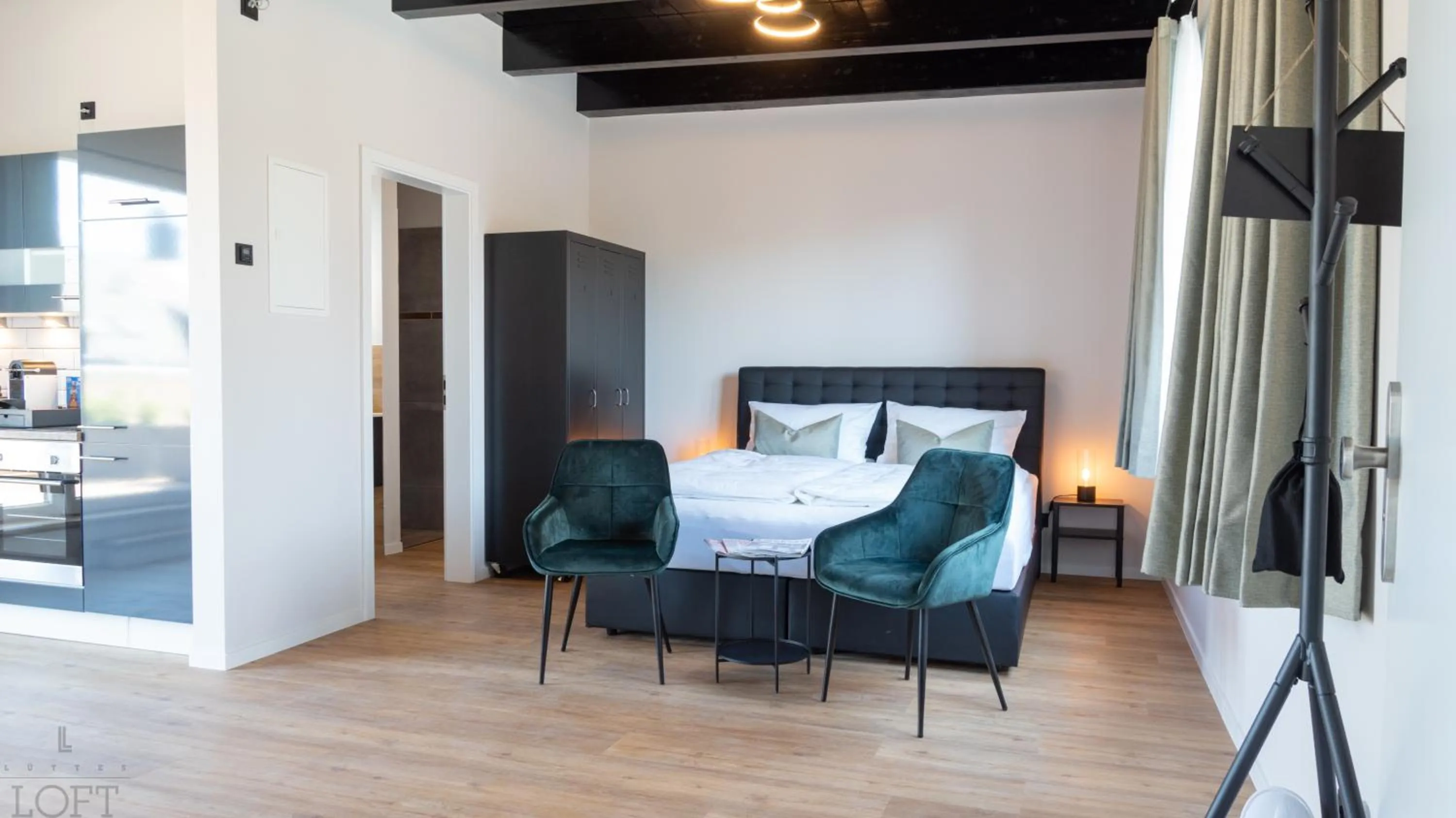 Bed in LÜTTES LOFT Boutique Hotel