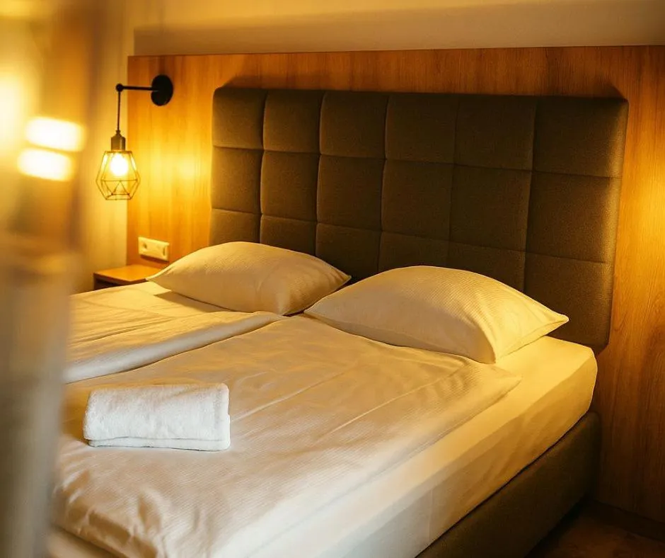 Bed in Plaza Hotel & Living Frankfurt