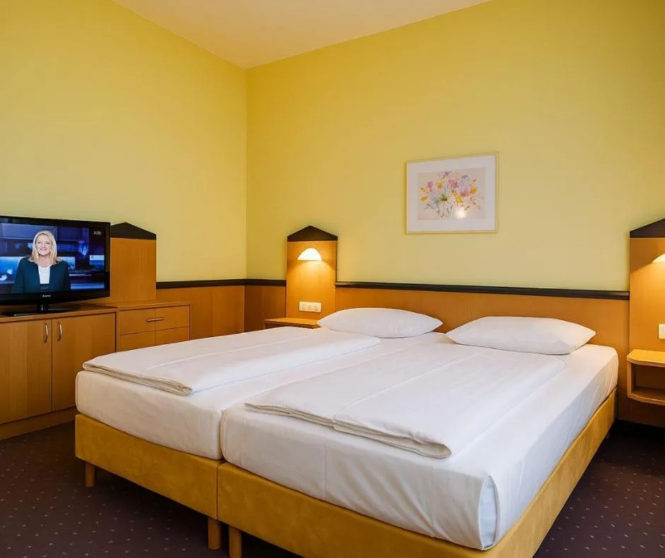 Bed in Plaza Hotel & Living Frankfurt