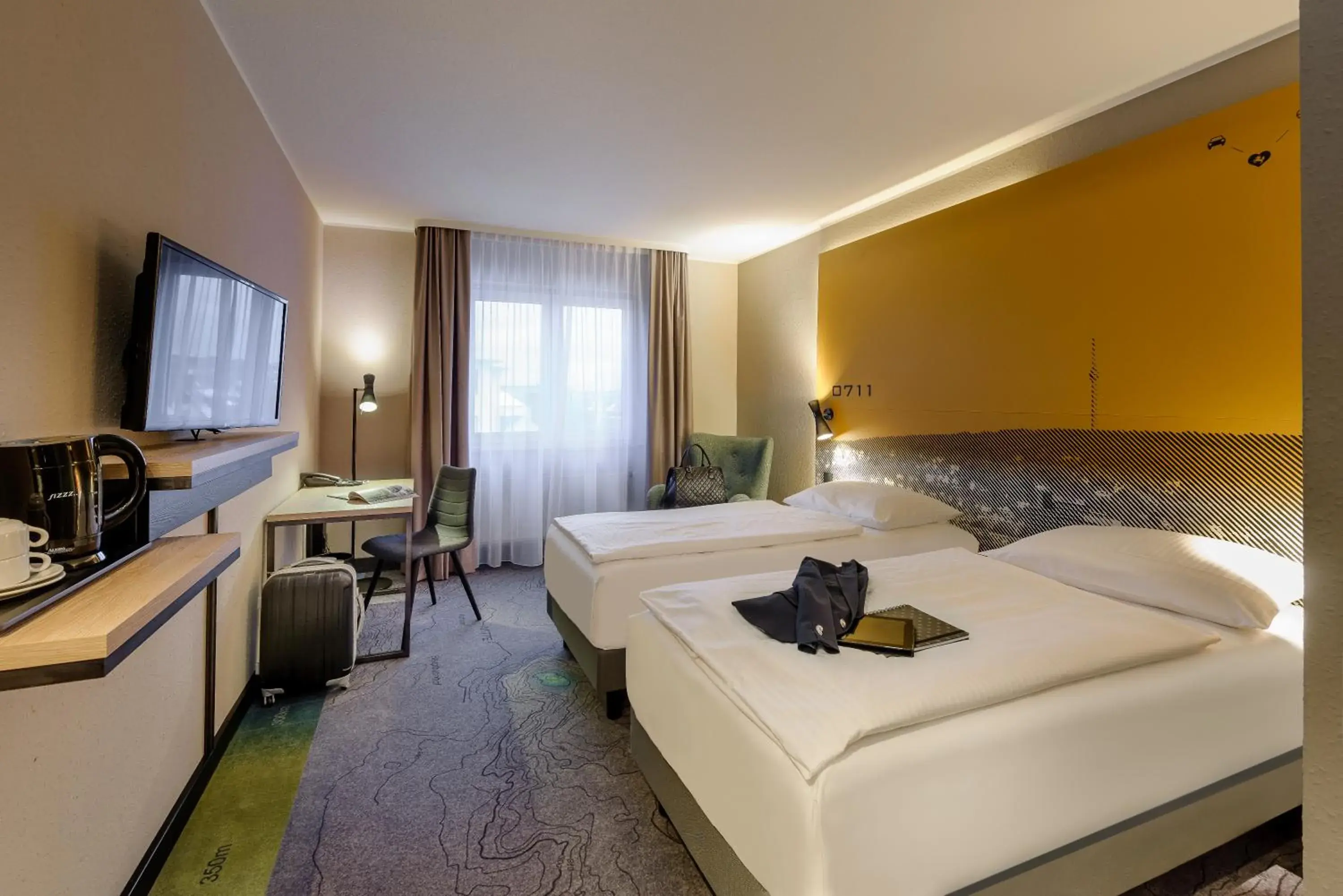 Photo of the whole room, Bed in Mercure Stuttgart Zuffenhausen Photo of the whole room, Bed in Mercure Stuttgart Zuffenhausen