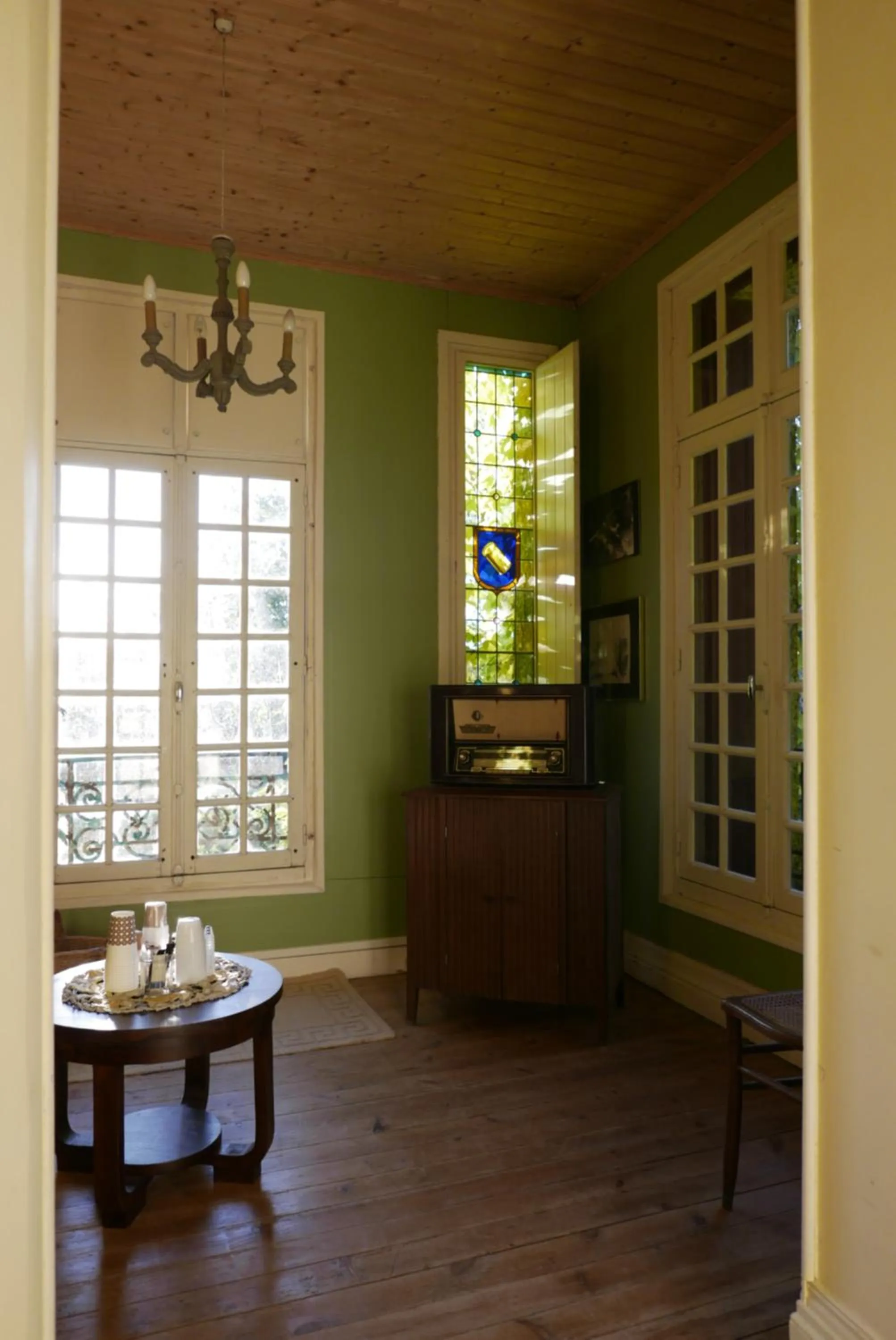 Communal lounge/ TV room in La Cure du Maine Charles