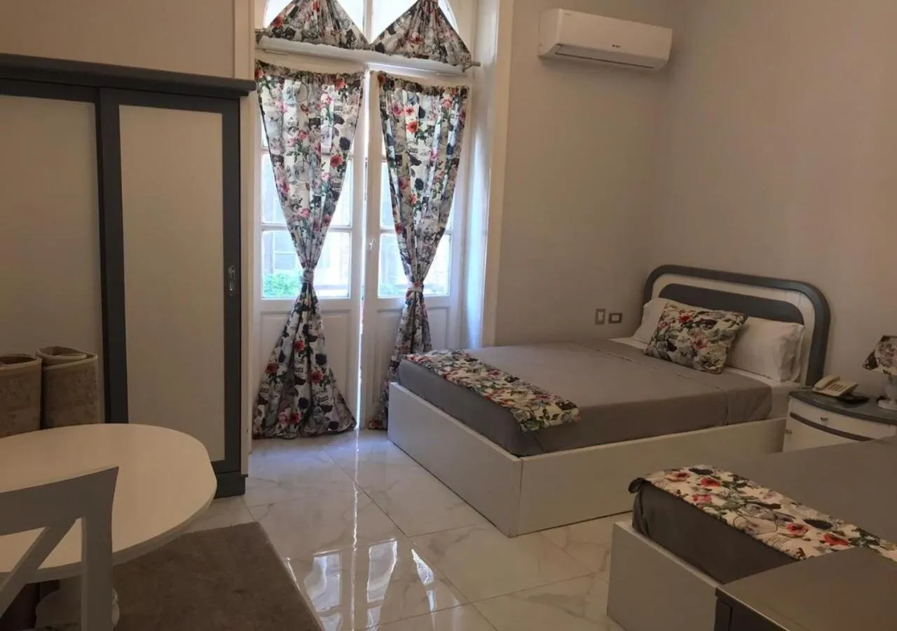 Photo of the whole room, Bed in columbia sky city hotel