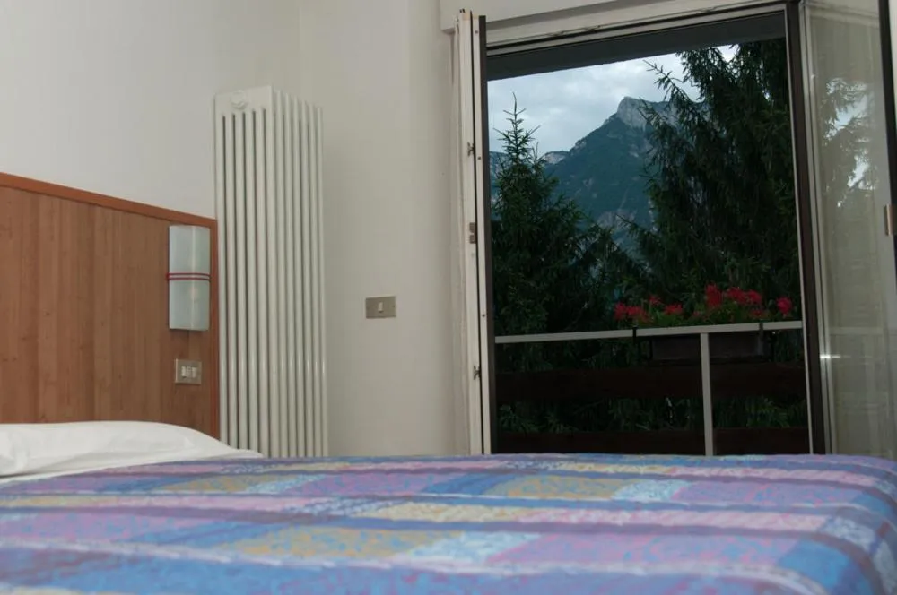 Bed in Hotel Dolomiti