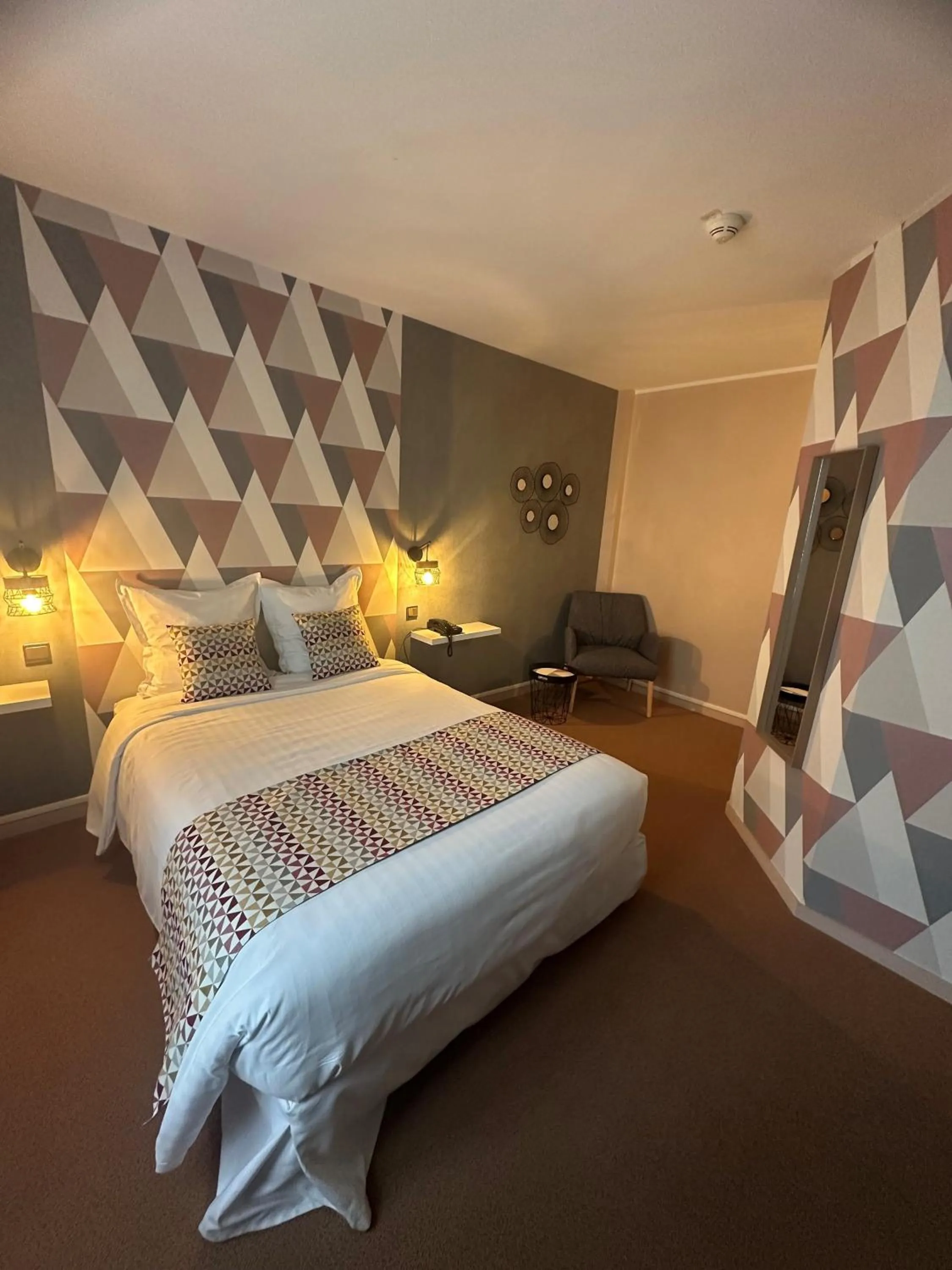 Bedroom, Bed in Logis Hotels - Château Saint Marcel