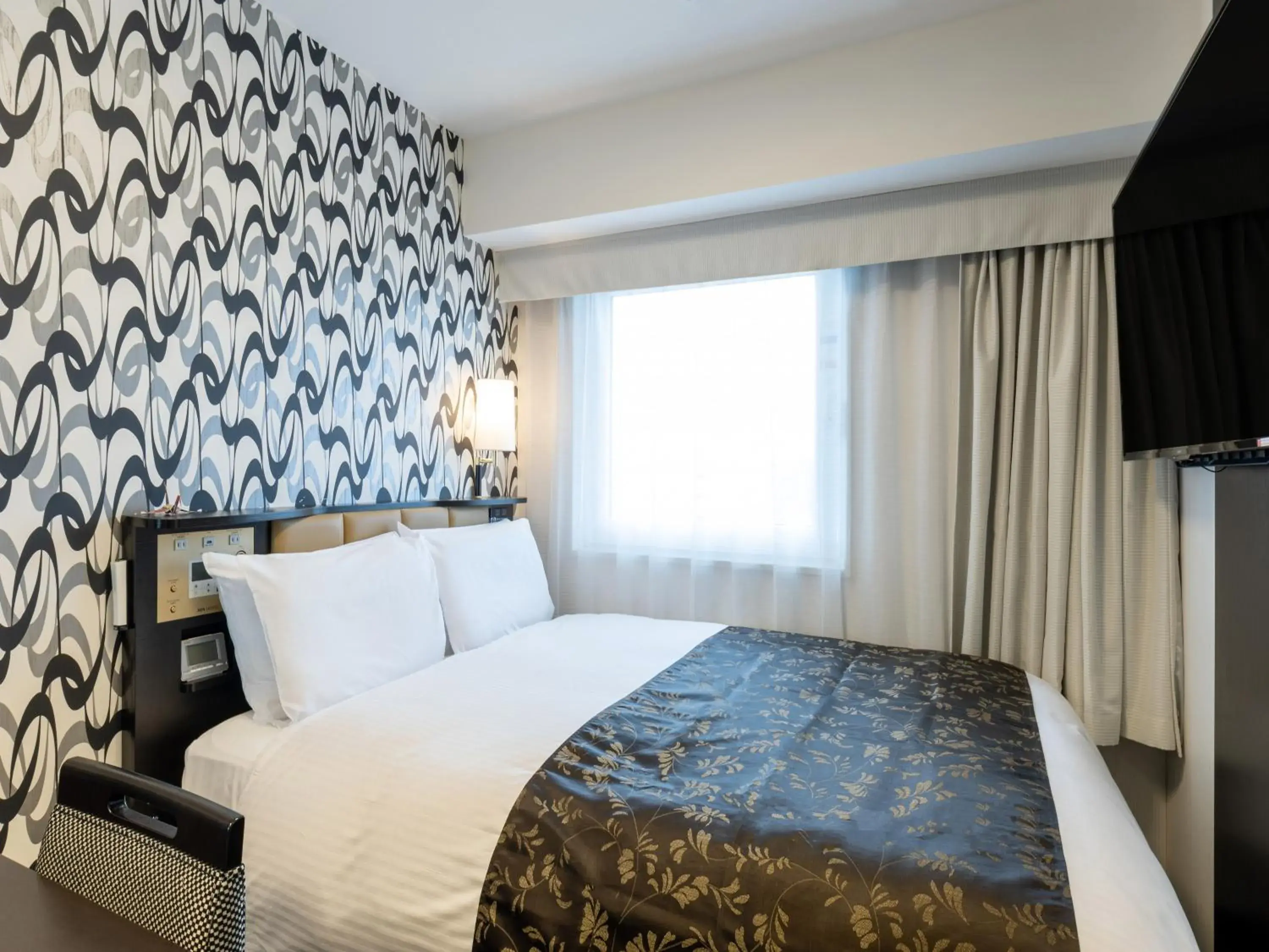 Photo of the whole room, Bed in APA Hotel Shin Osaka Ekimae Photo of the whole room, Bed in APA Hotel Shin Osaka Ekimae