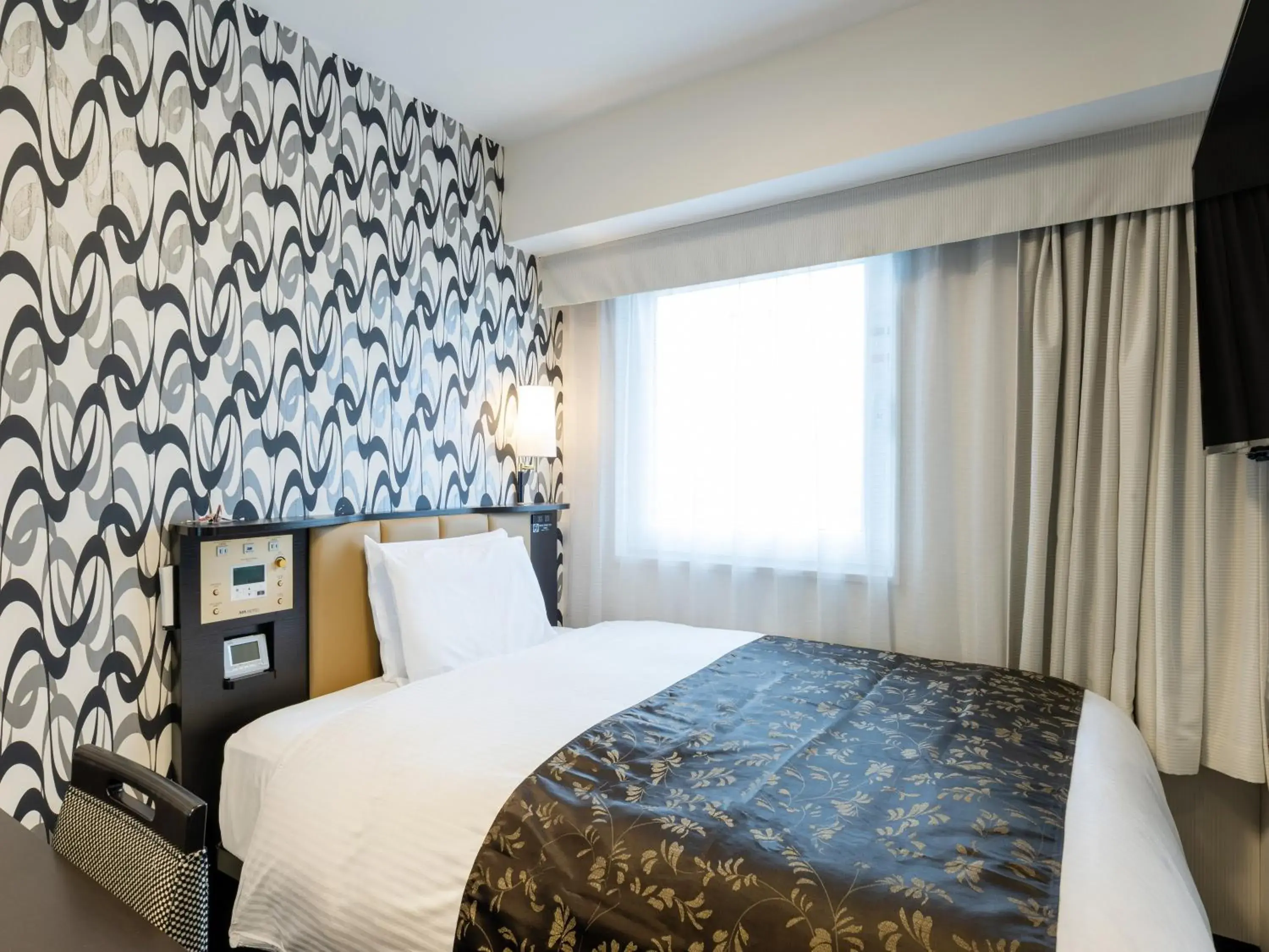 Photo of the whole room, Bed in APA Hotel Shin Osaka Ekimae Photo of the whole room, Bed in APA Hotel Shin Osaka Ekimae