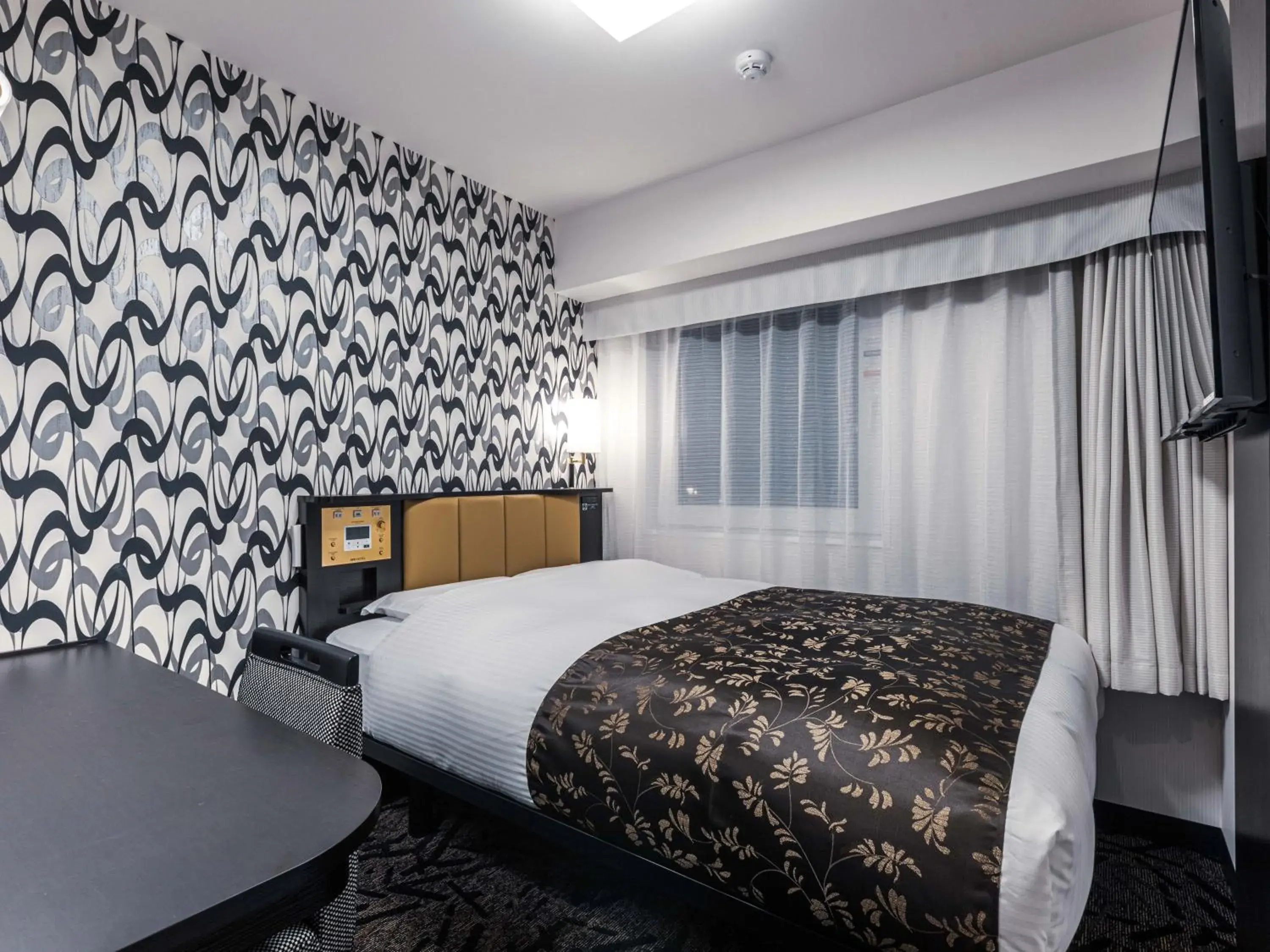 Photo of the whole room, Bed in APA Hotel Shin Osaka Ekimae Photo of the whole room, Bed in APA Hotel Shin Osaka Ekimae