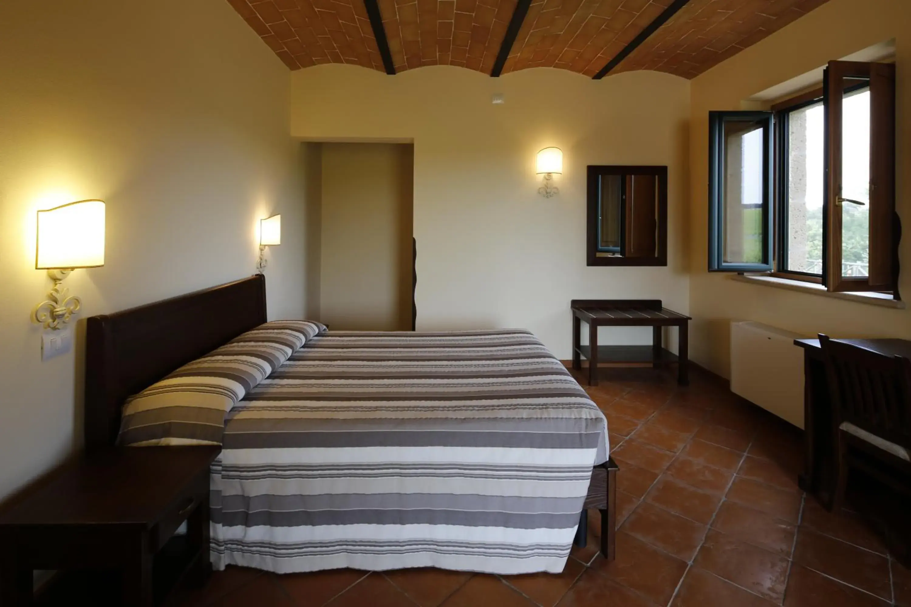 Photo of the whole room, Bed in Agriturismo Poggio Al Tufo Photo of the whole room, Bed in Agriturismo Poggio Al Tufo