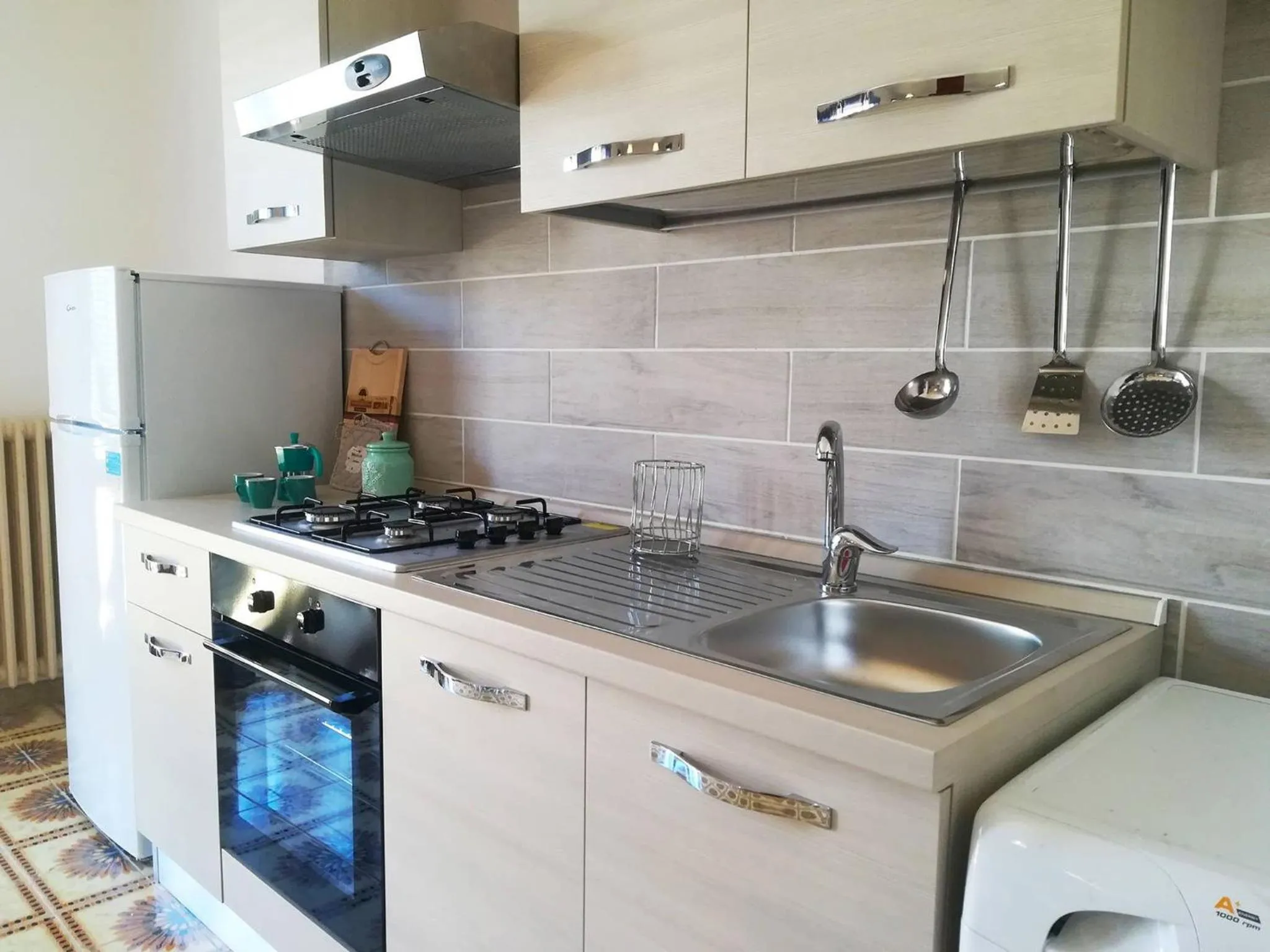kitchen in Elegant Apartment With Sea View In Otranto, Wifi, Air Conditioning And Parking