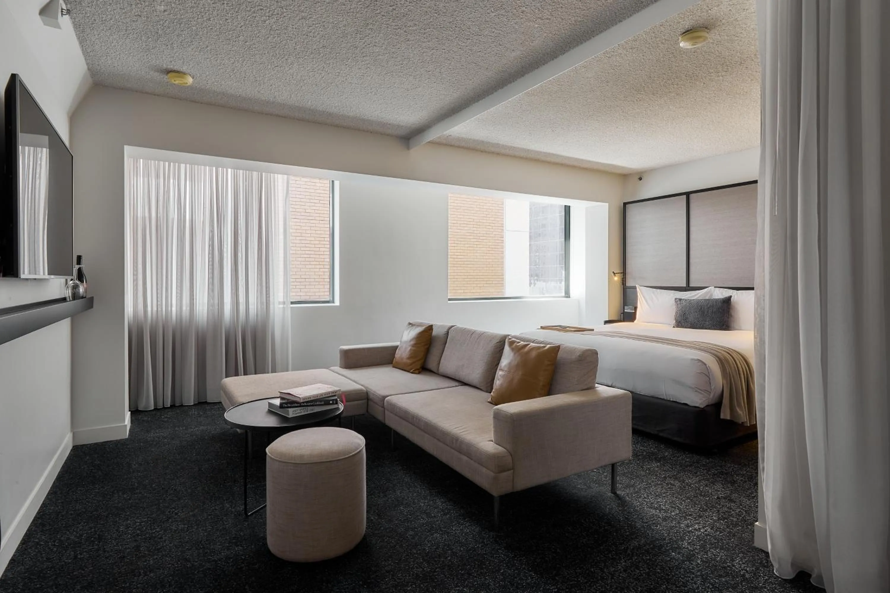 Seating area, Bed in Lancemore Crossley St. Melbourne