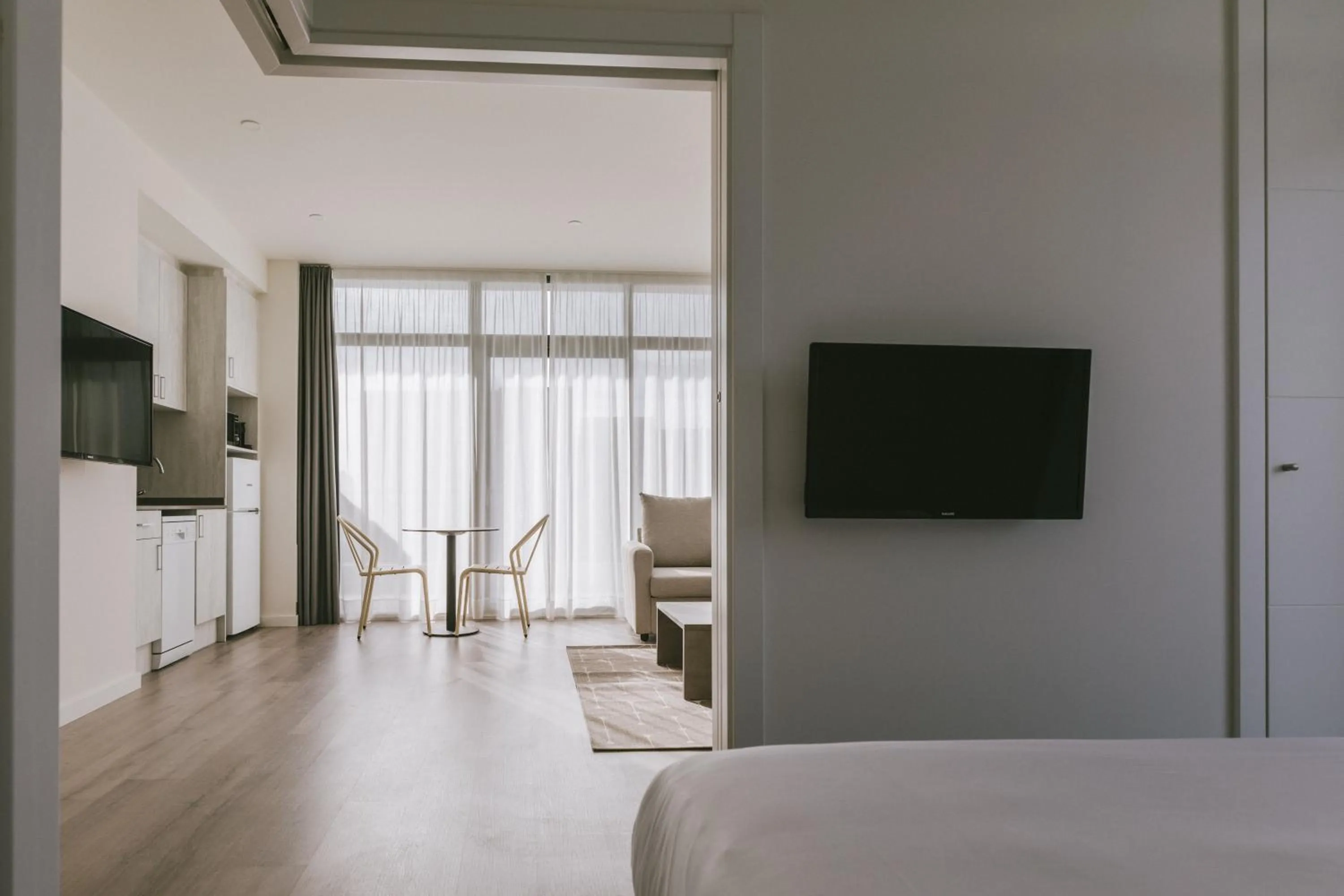 Seating area, Bed in CIM Aparthotel