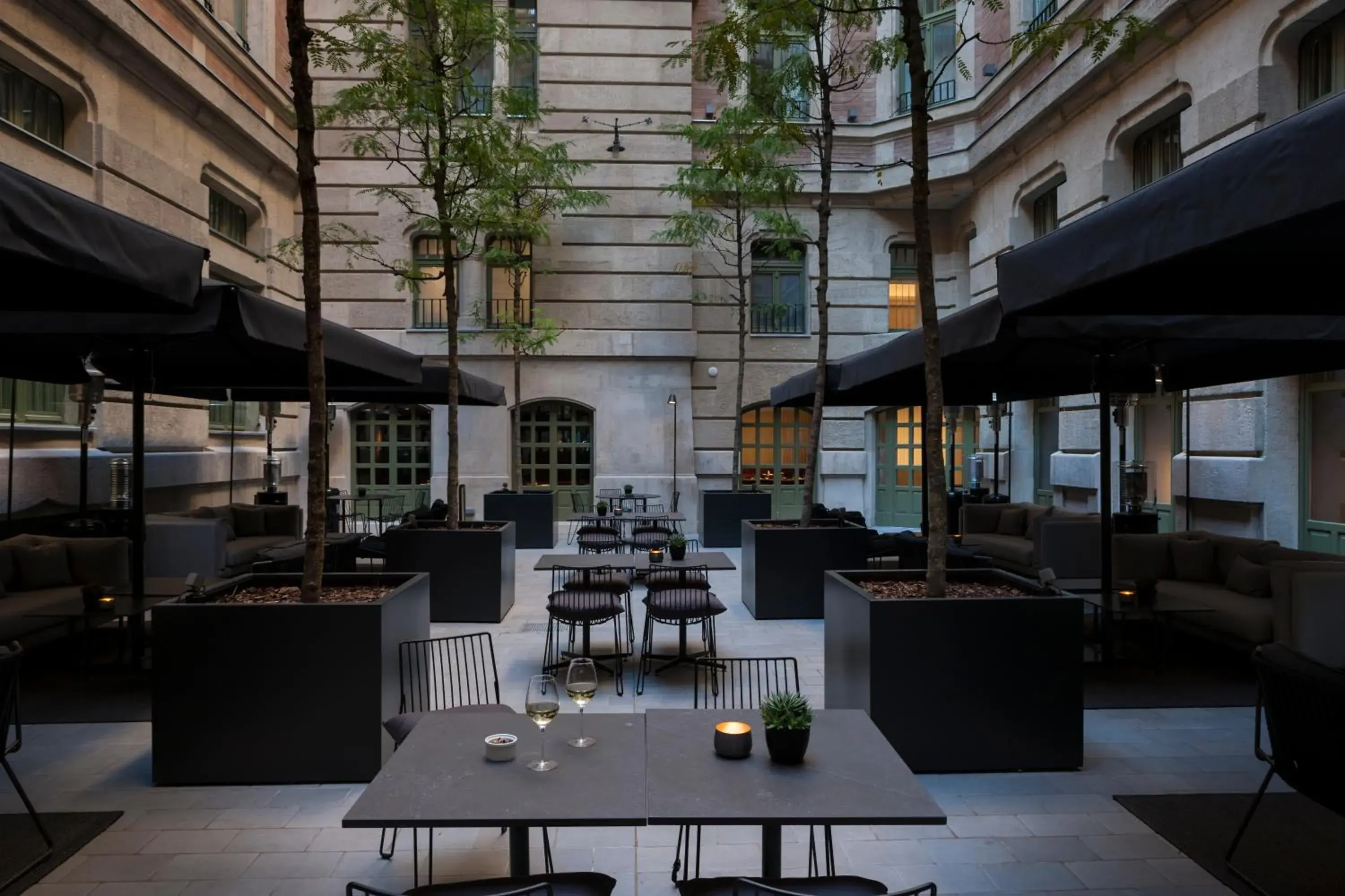 Inner courtyard view in Kozmo Hotel Suites & Spa - Small Luxury Hotels of the World Inner courtyard view in Kozmo Hotel Suites & Spa - Small Luxury Hotels of the World