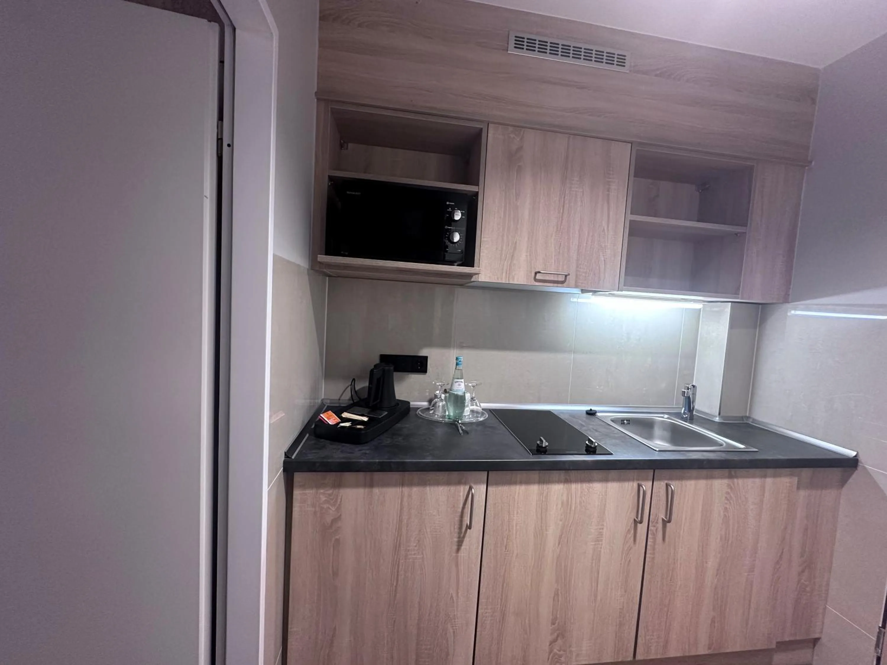 Kitchen or kitchenette in Apartment-Hotel Hamburg Mitte