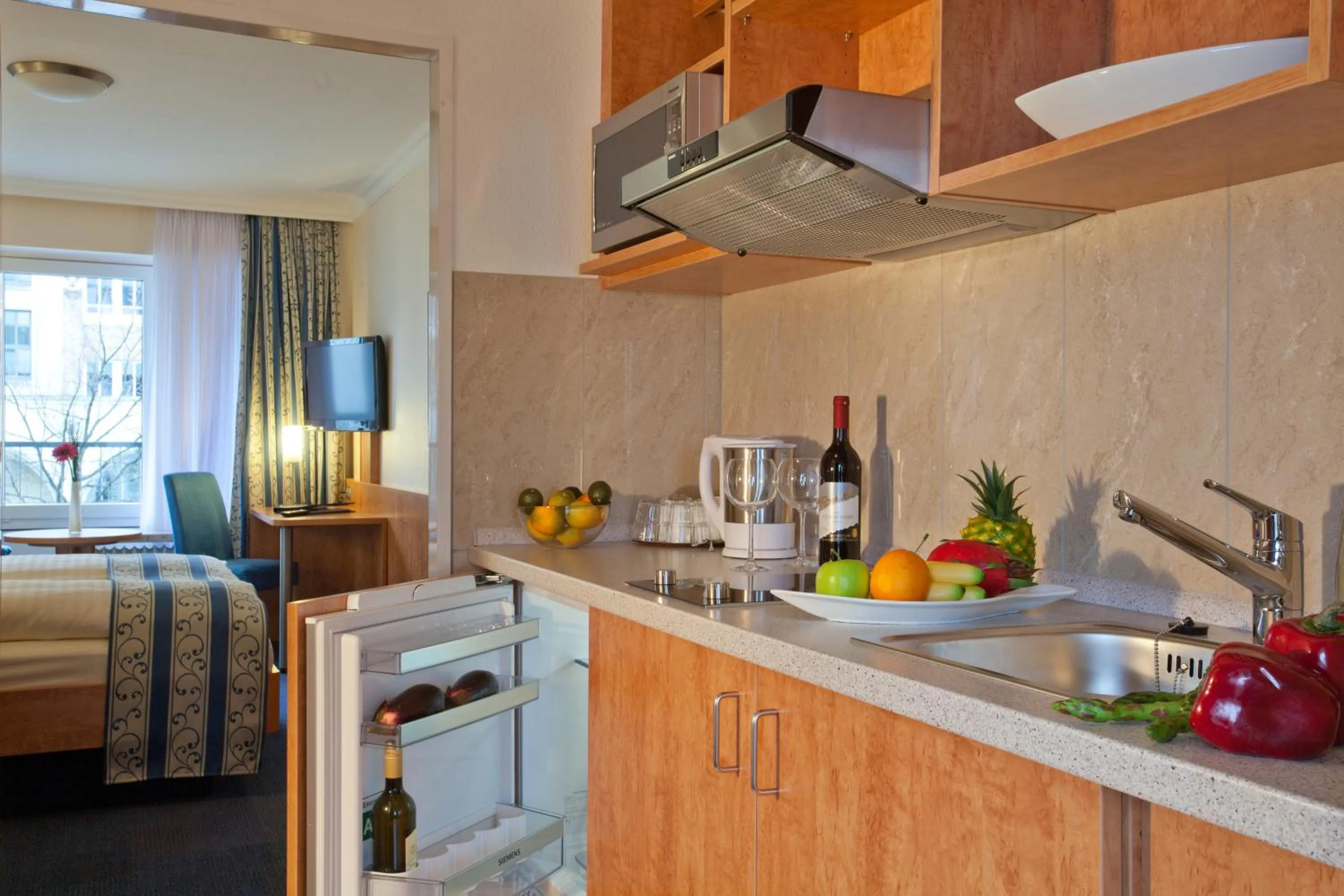 Kitchen or kitchenette in Apartment-Hotel Hamburg Mitte