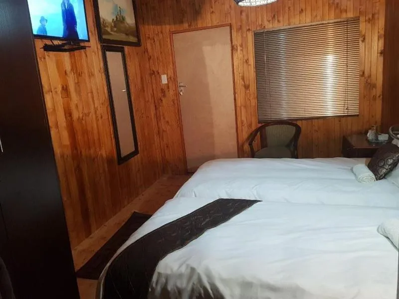 Bed in Lauren Palace Guest House