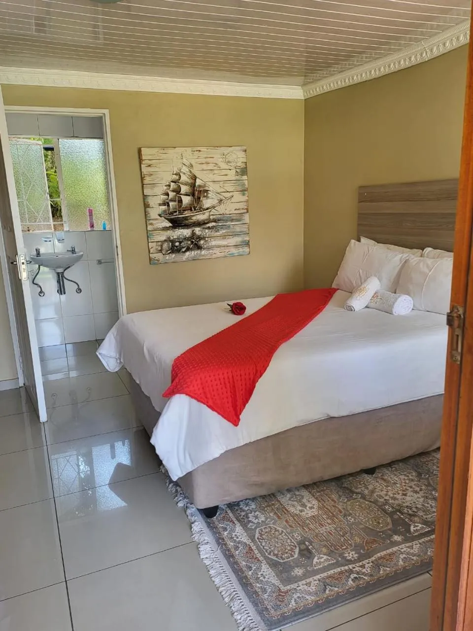 Bed in Lauren Palace Guest House