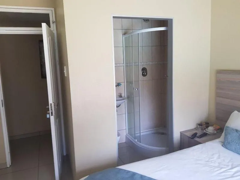 Bed in Lauren Palace Guest House