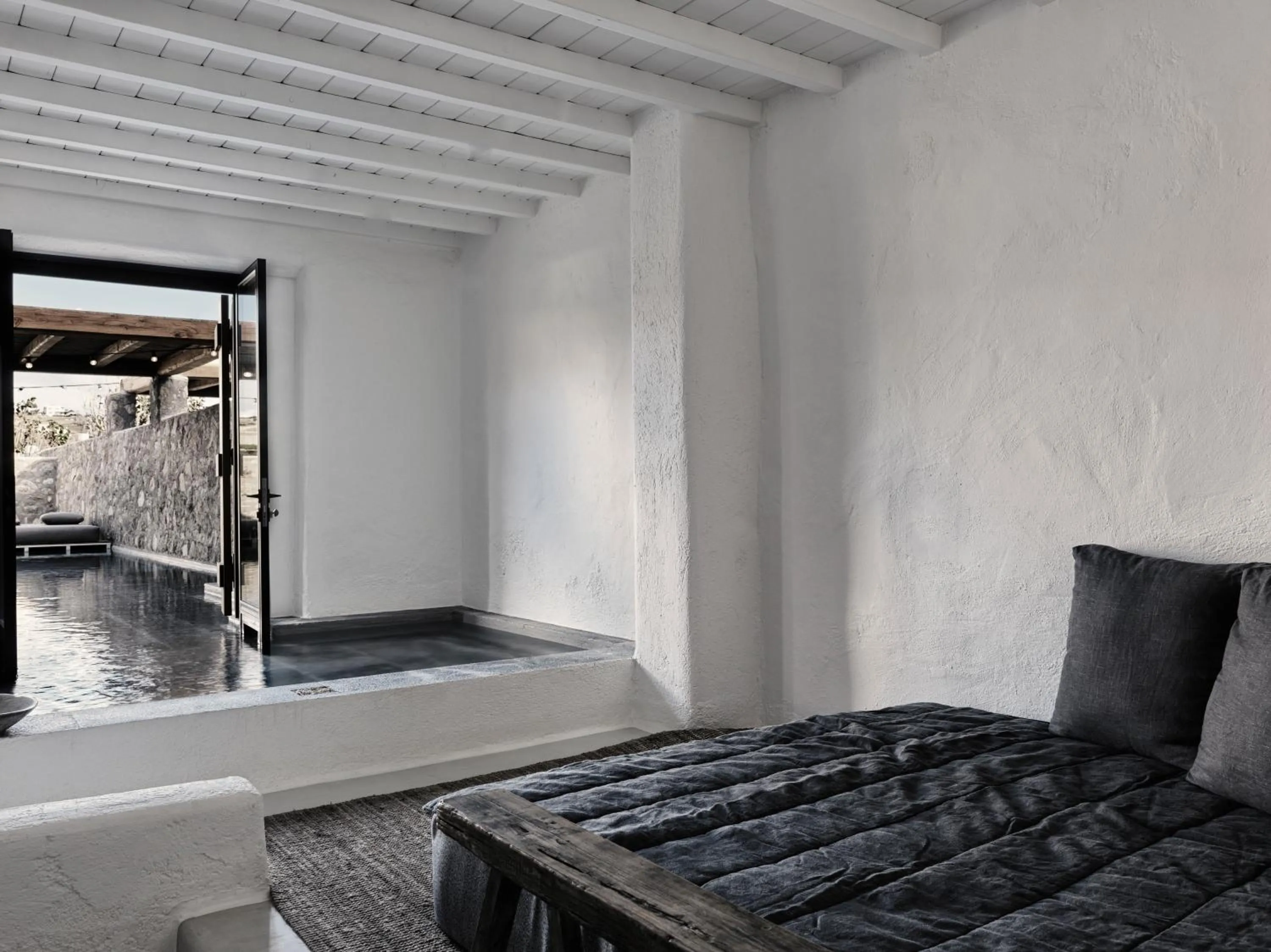 Swimming pool, Bed in Nomad Mykonos - Small Luxury Hotels of the World