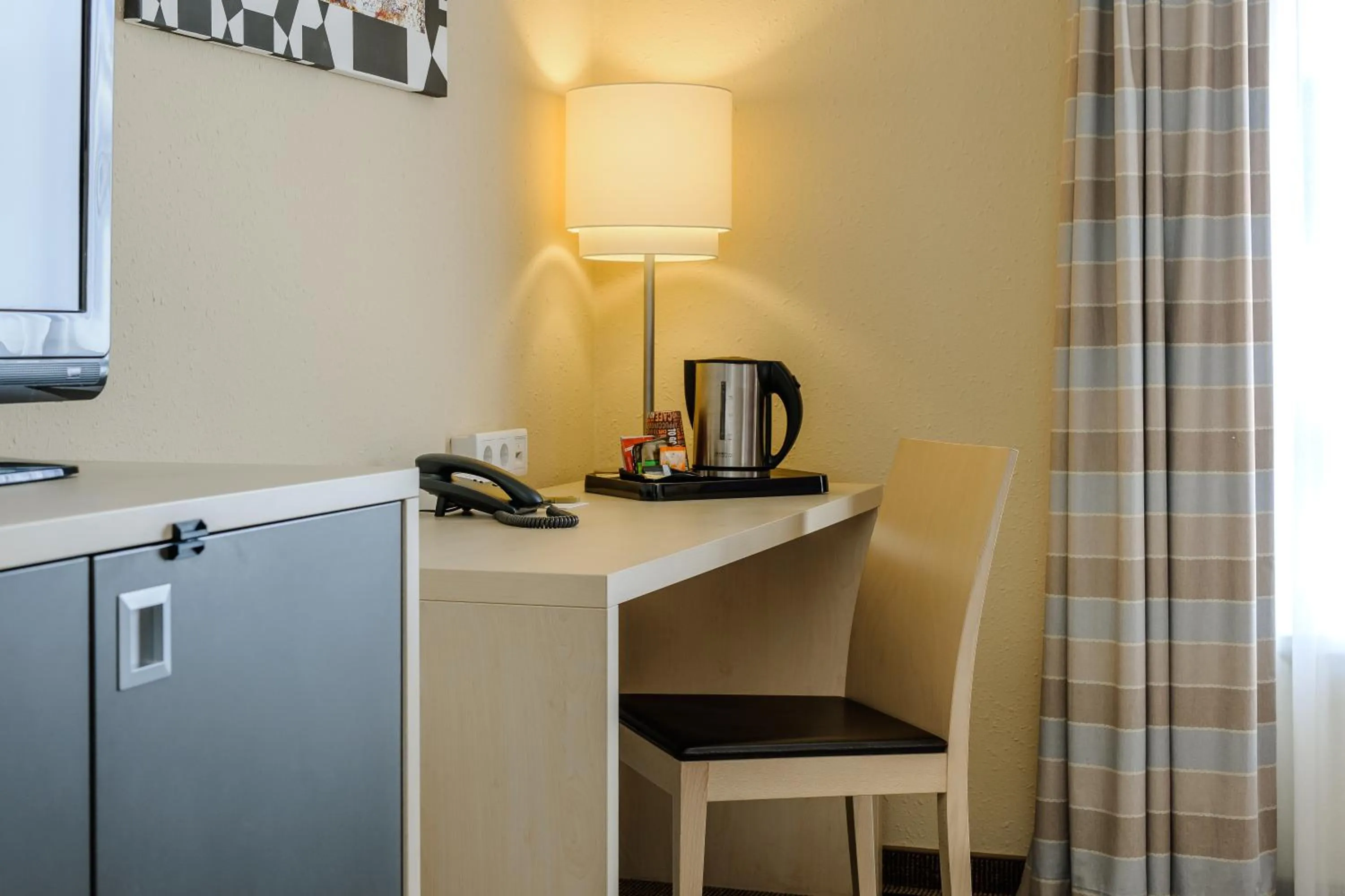 Photo of the whole room in Mercure Hotel Berlin City West