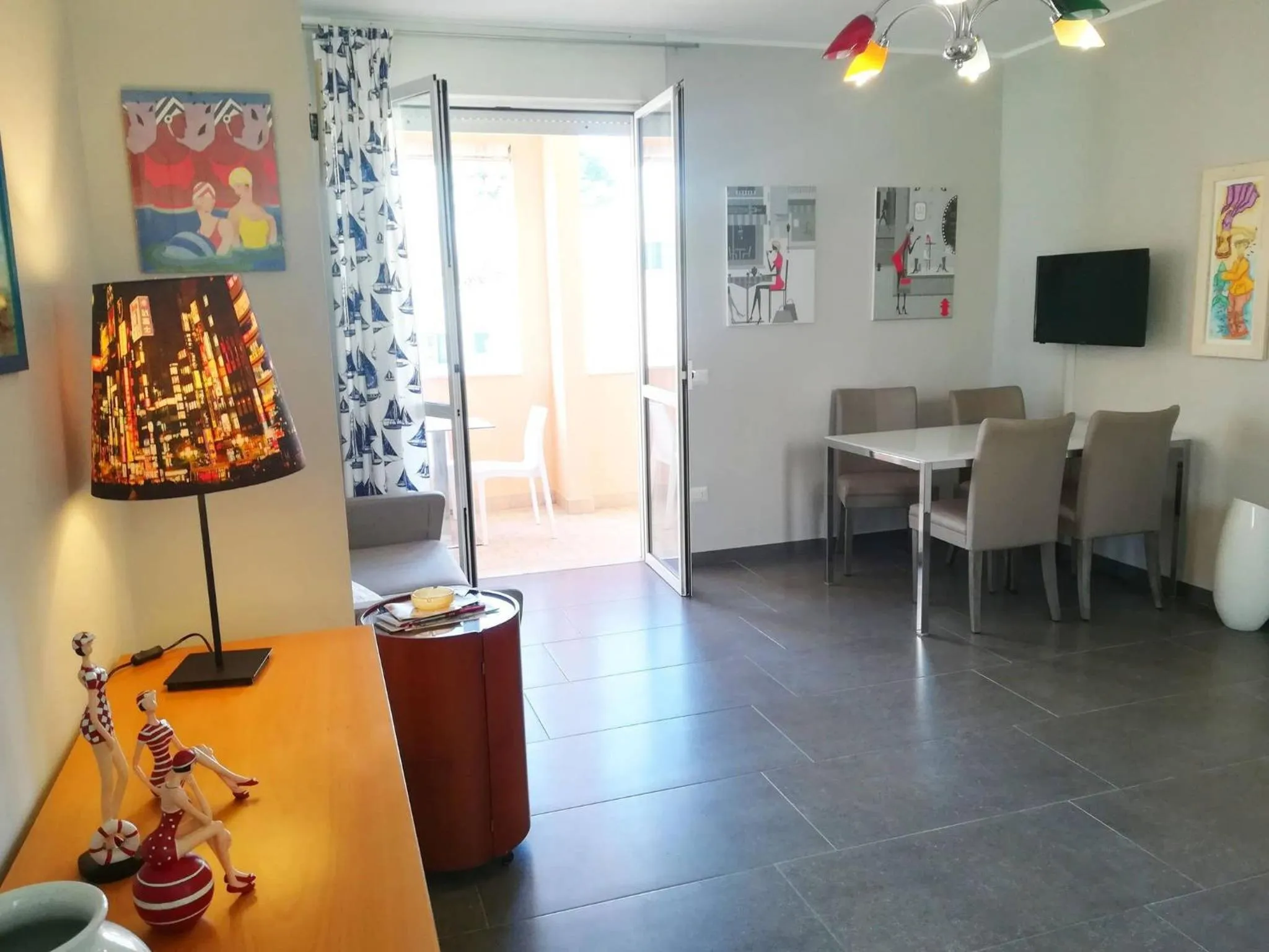 Seating area in Modern Holiday Apartment With Wi-fi, Air Conditioning And Balcony; Pets Allowed