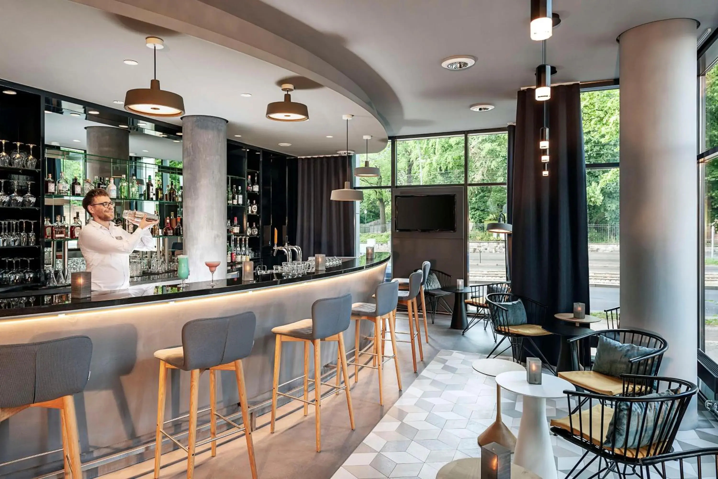 Lounge or bar in NH Berlin Alexanderplatz Lounge or bar in NH Berlin Alexanderplatz