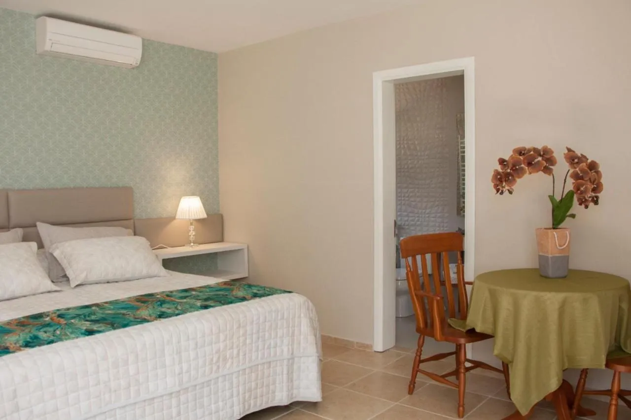 Bed in Hotel Cozumel Sierra