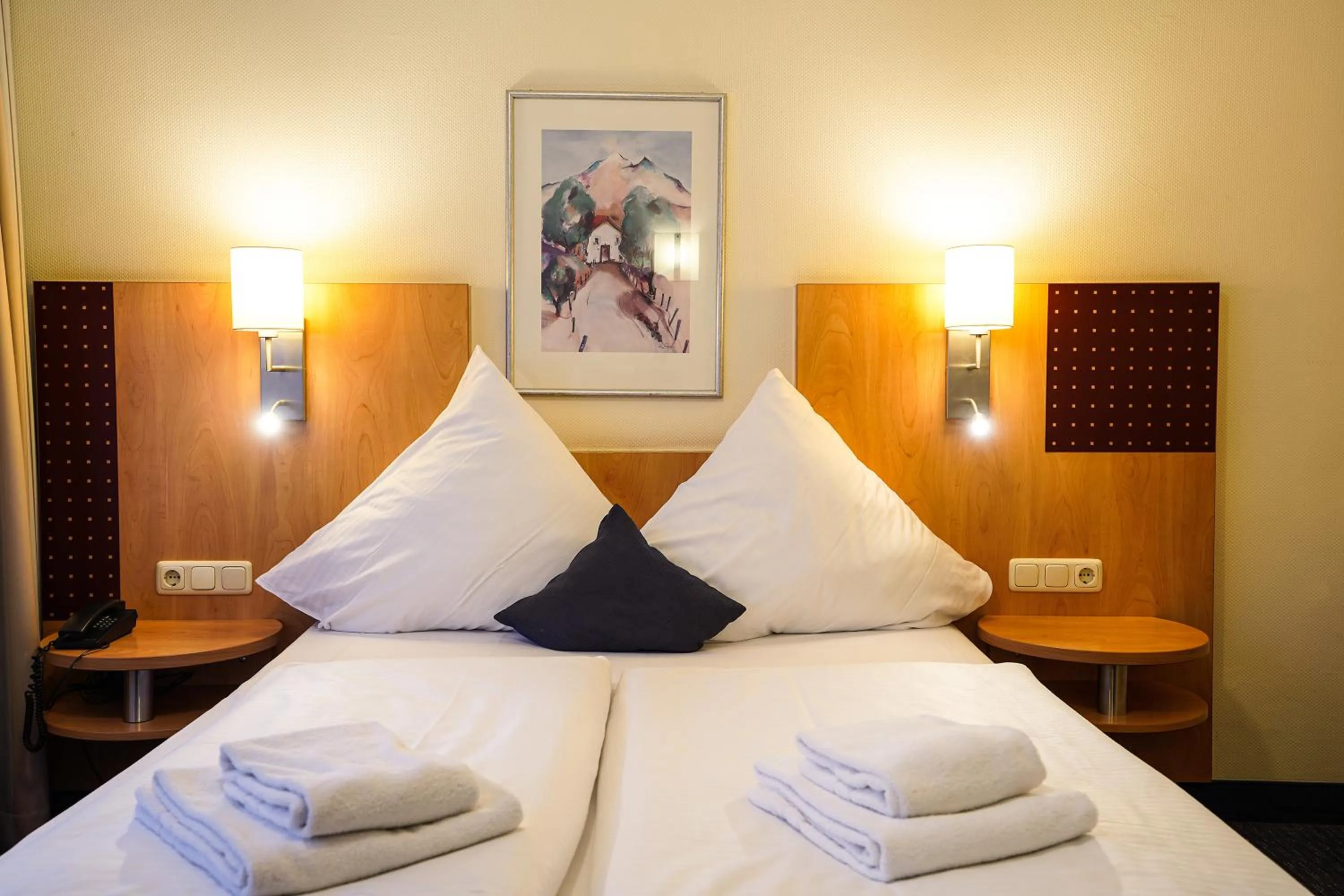 Bed in Hotel Scala Frankfurt City Centre