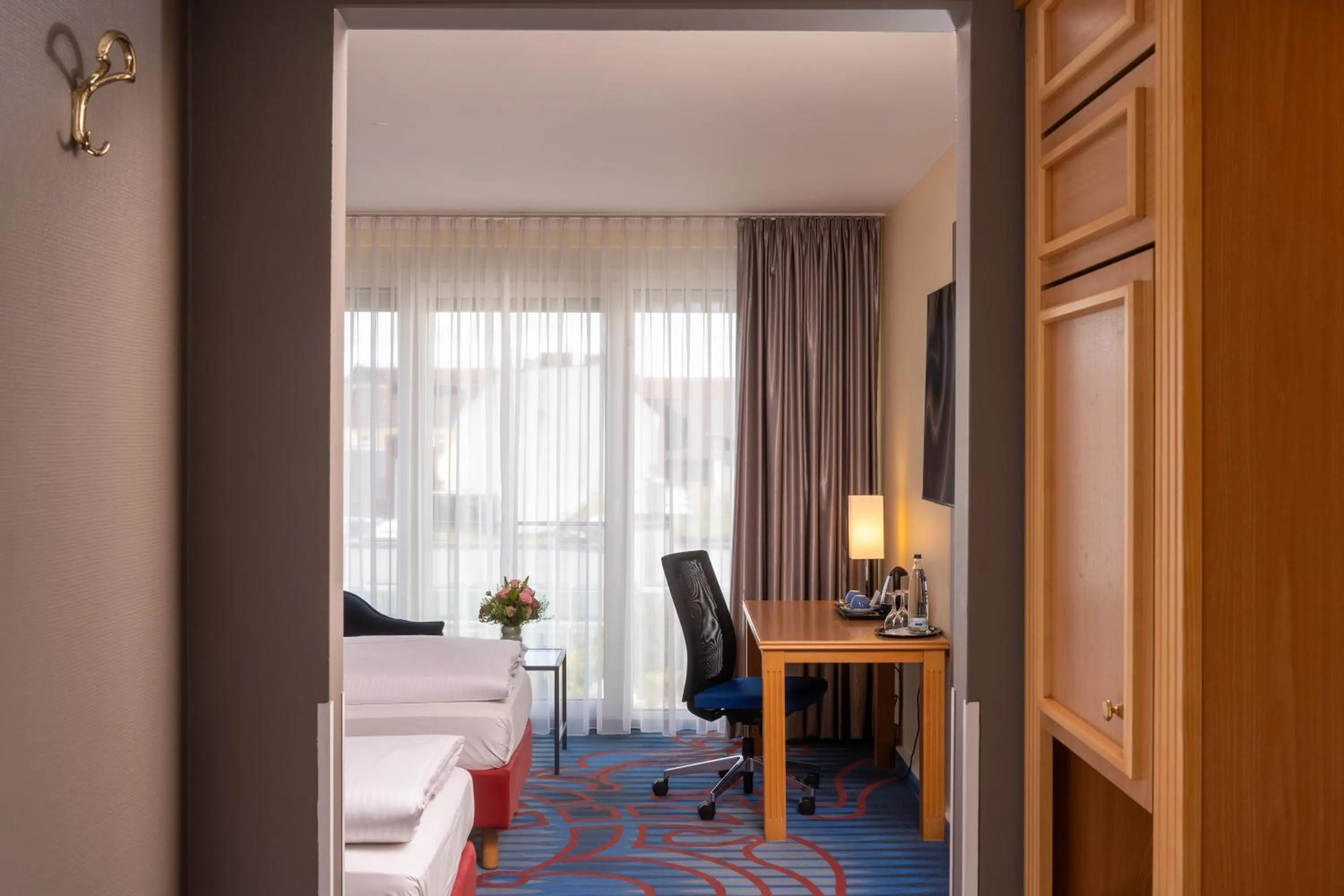Photo of the whole room, Bed in Mercure Hotel Berlin Tempelhof