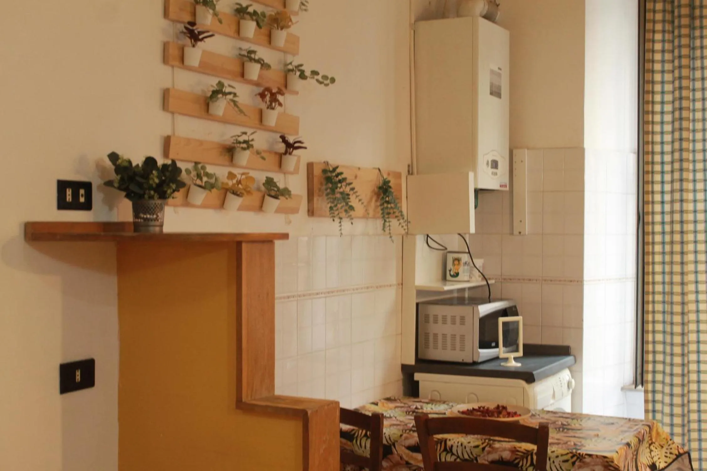 Kitchen or kitchenette in Daffodil in Roma San Pietro