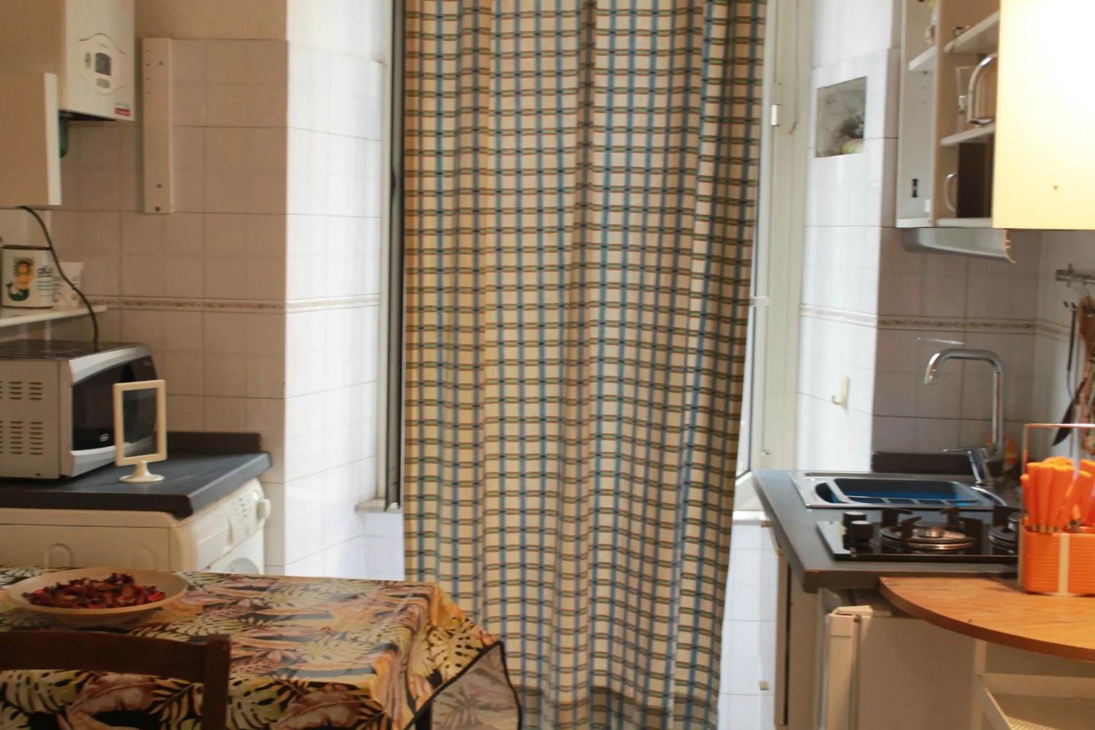 Kitchen or kitchenette in Daffodil in Roma San Pietro