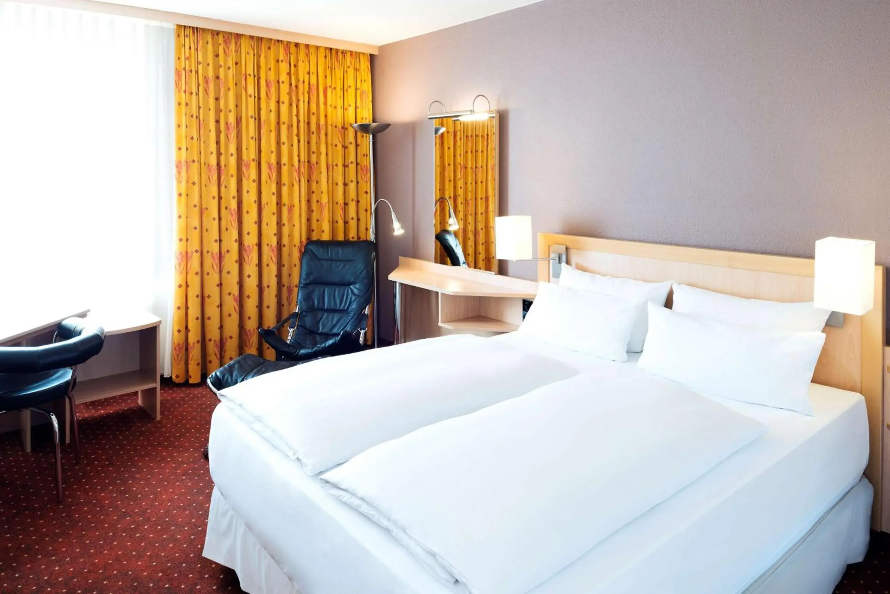 Photo of the whole room, Bed in NH Leipzig Messe Photo of the whole room, Bed in NH Leipzig Messe
