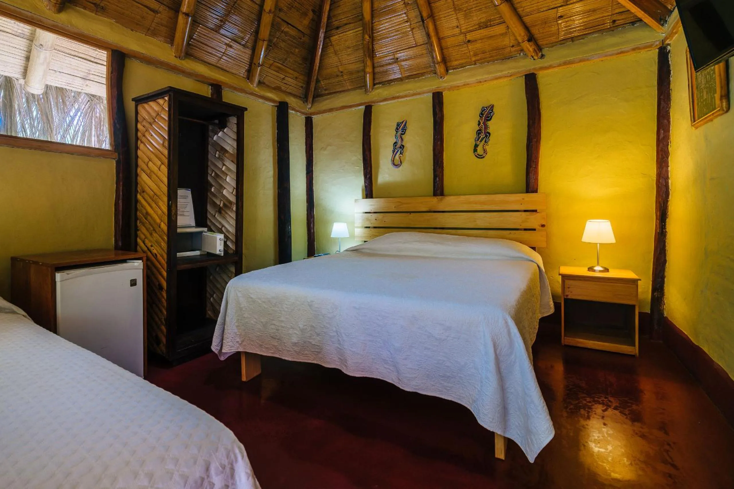 Bed in Kimbas Bungalows Mancora