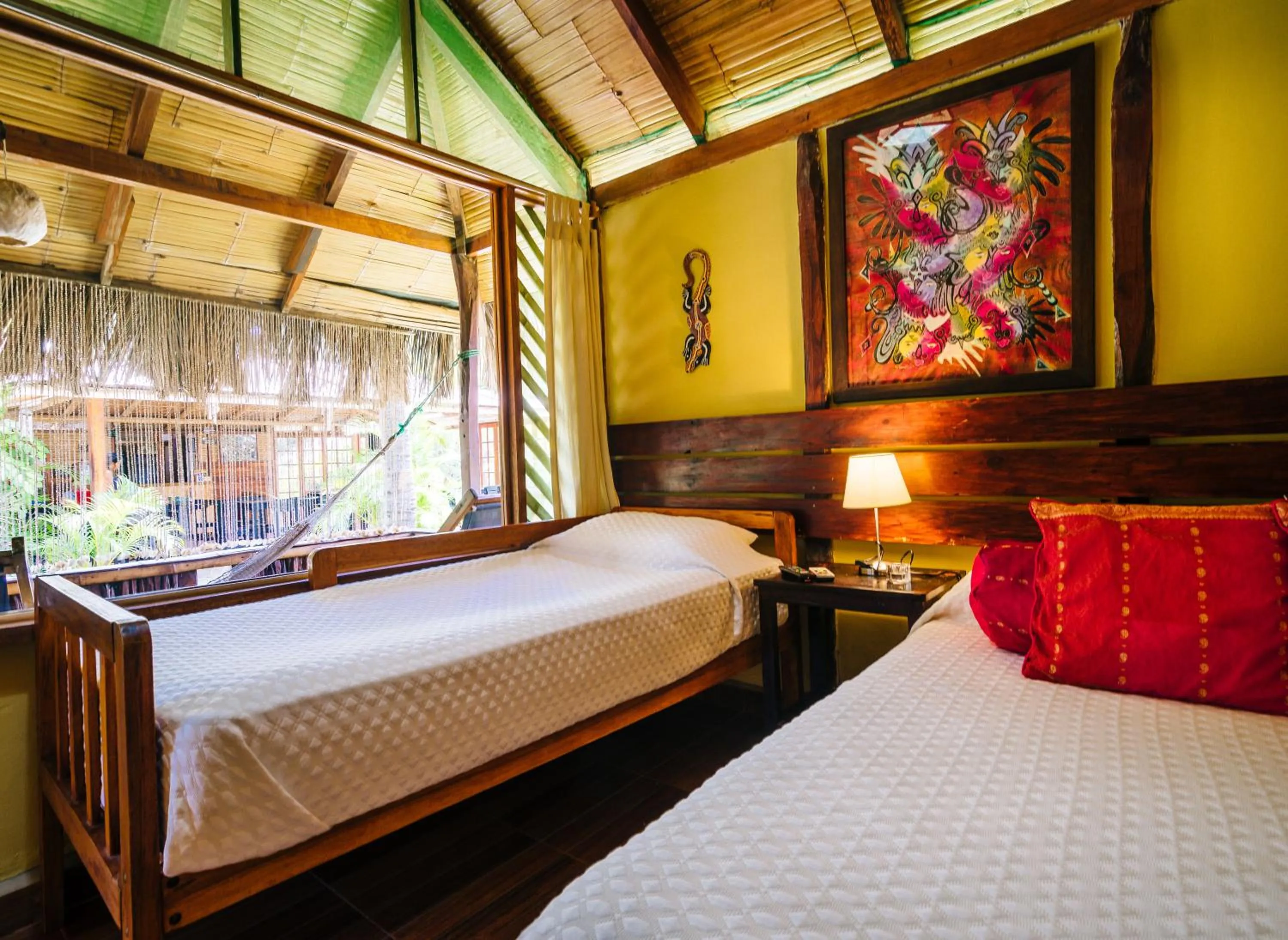 Bed in Kimbas Bungalows Mancora