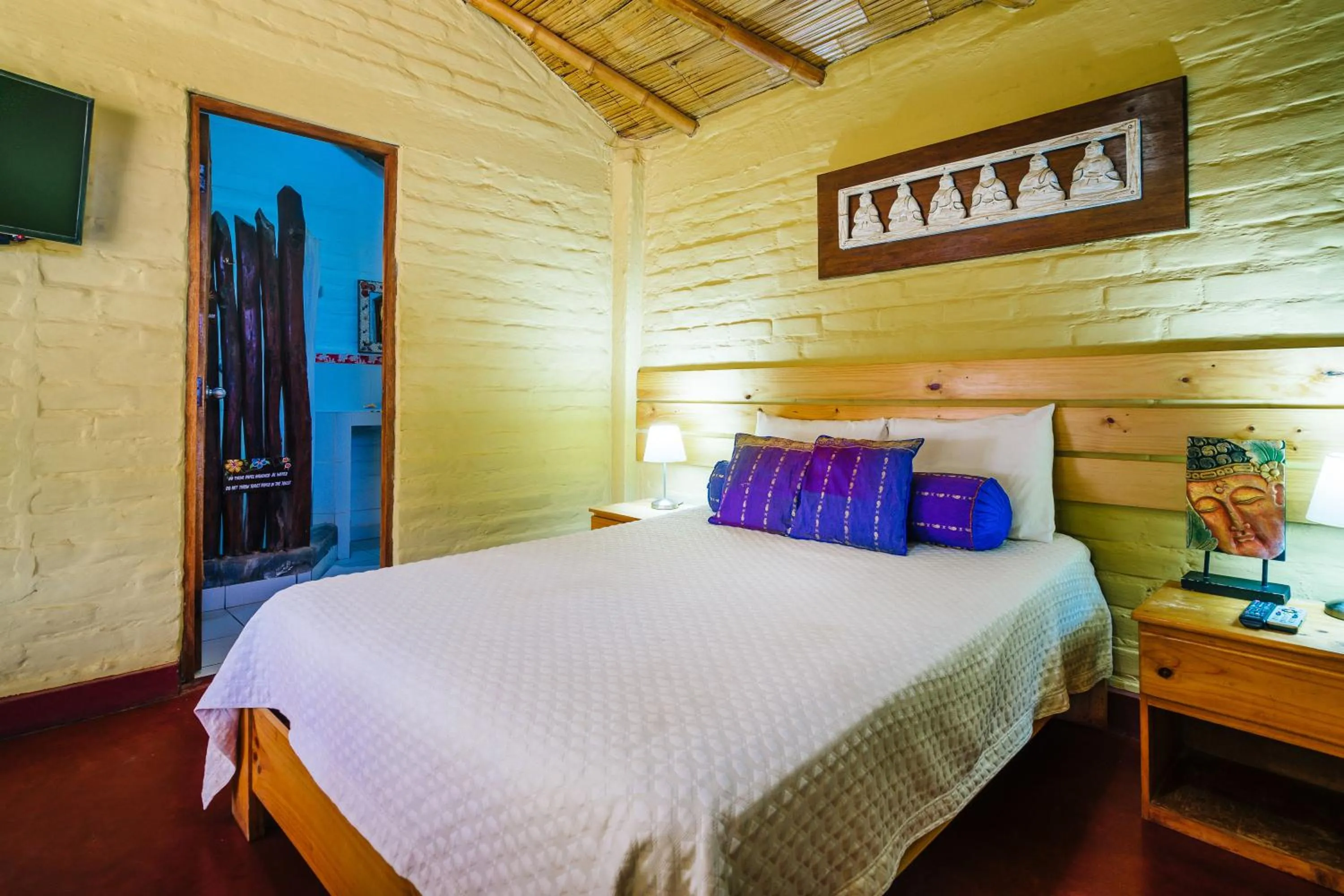 Bed in Kimbas Bungalows Mancora
