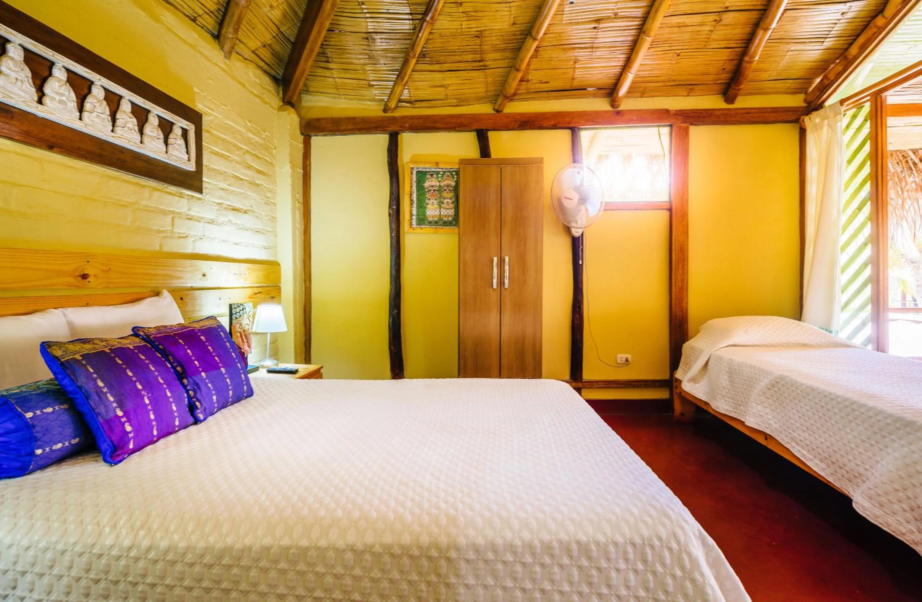 Bed in Kimbas Bungalows Mancora