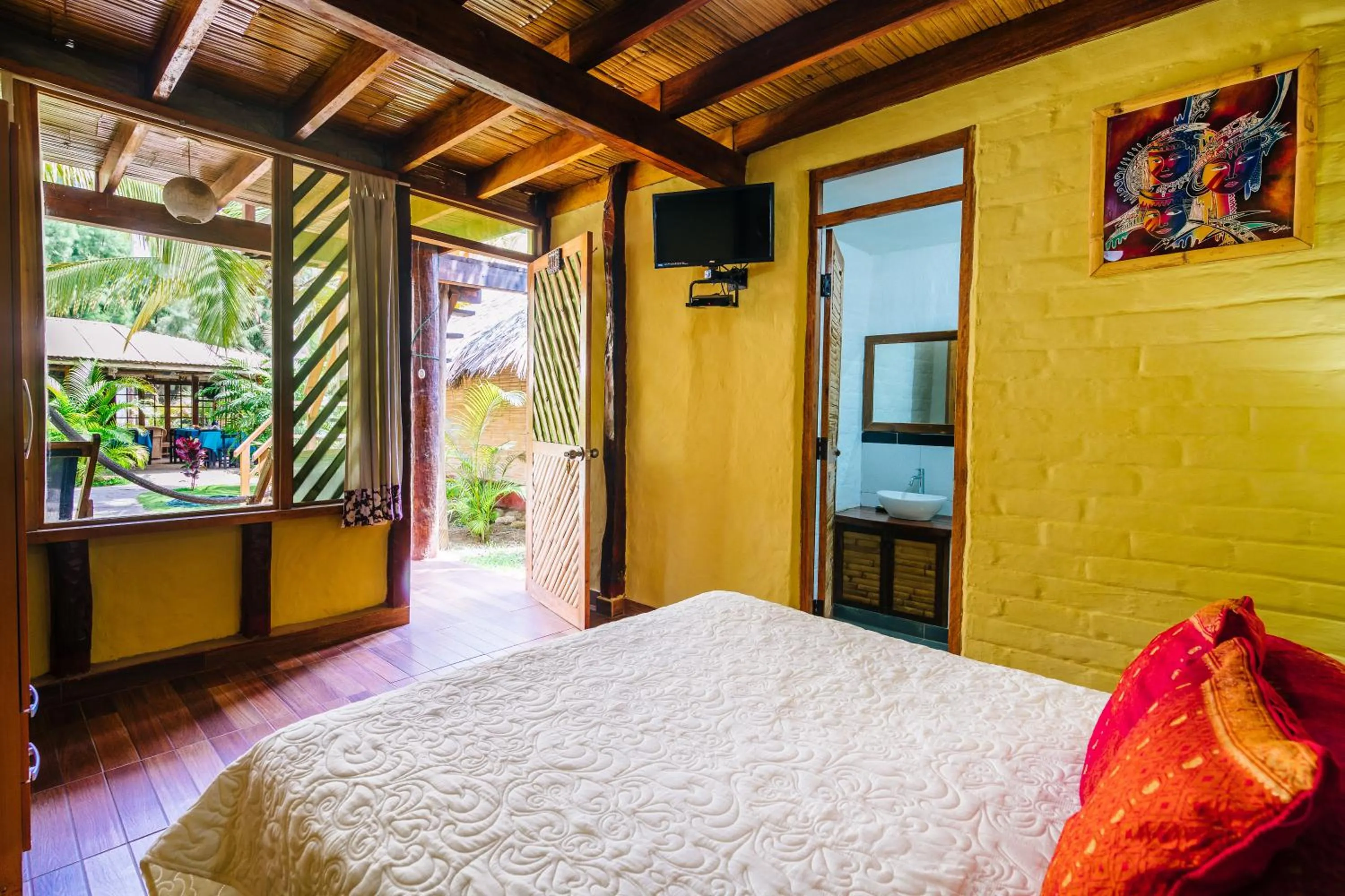 Bed in Kimbas Bungalows Mancora