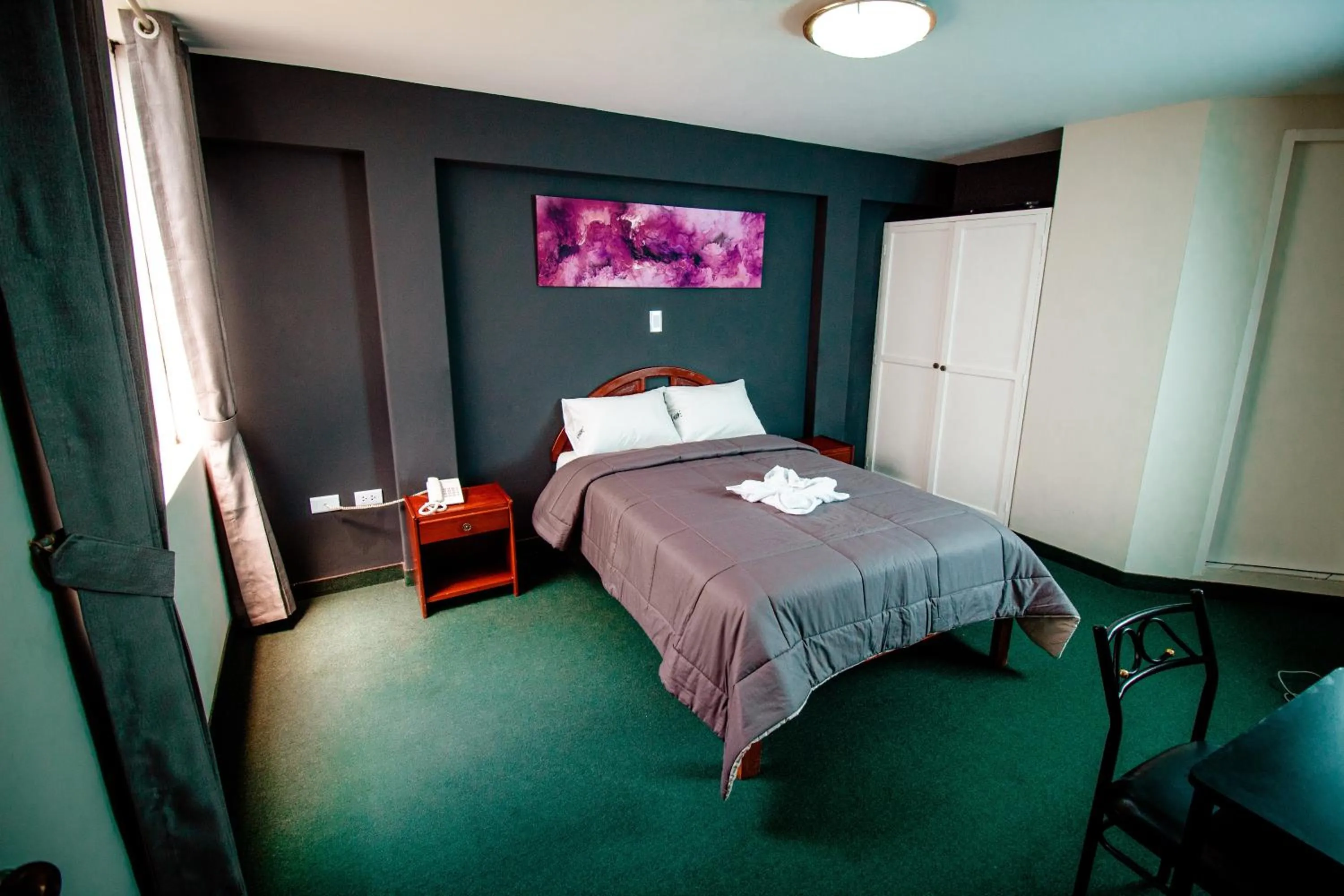 Bed in Saint Germain Hotel