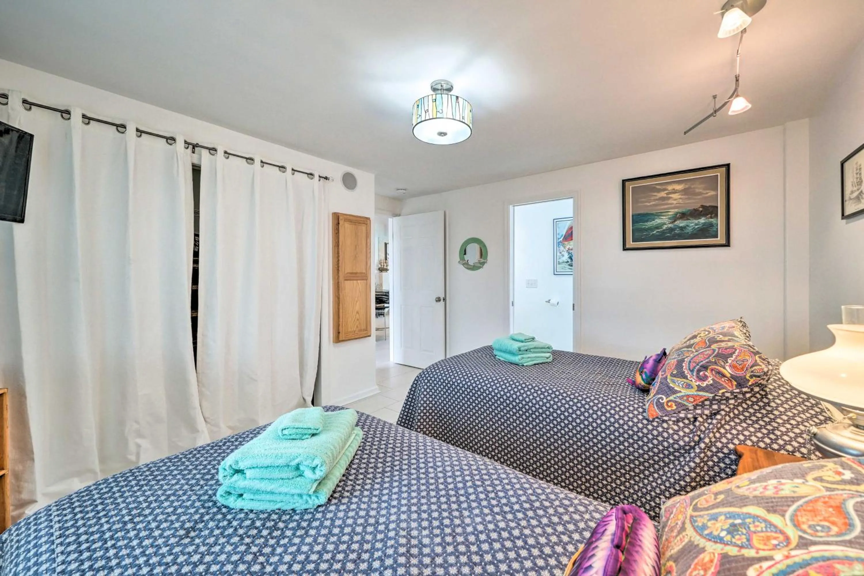 Bed in Ocean Dunes Kure Beach Condo with Balcony and Pool