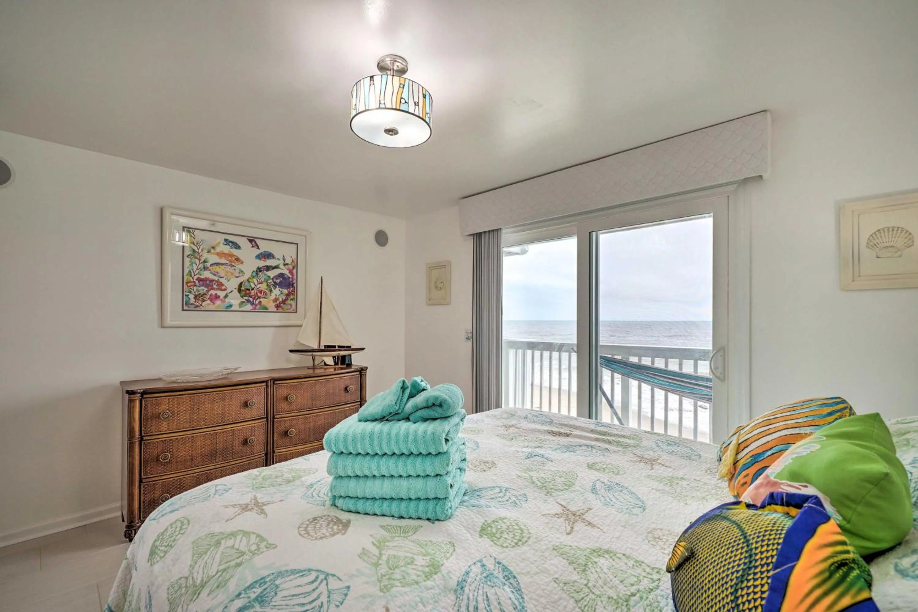 Bed in Ocean Dunes Kure Beach Condo with Balcony and Pool