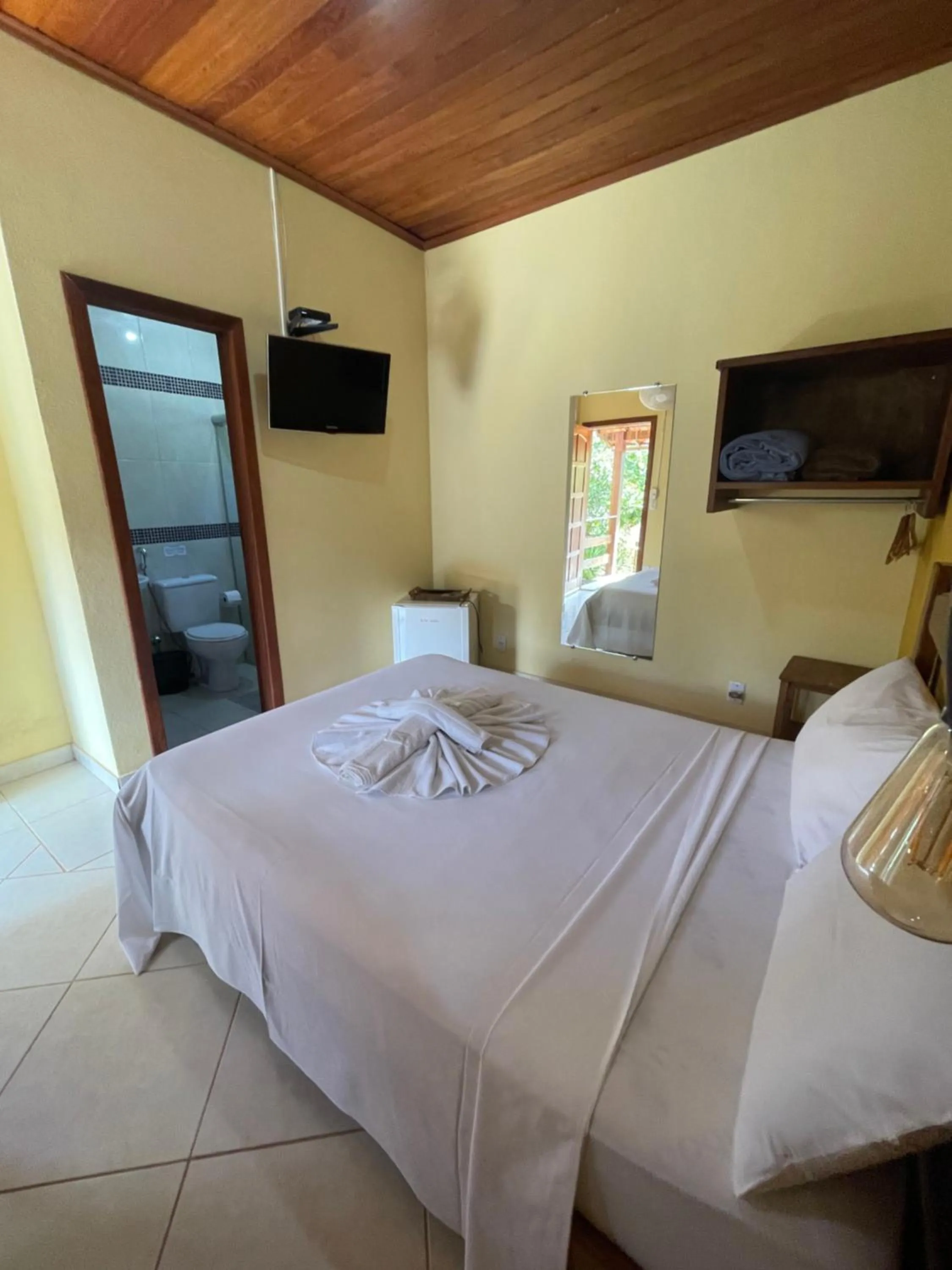 Bed in Pousada Licuri