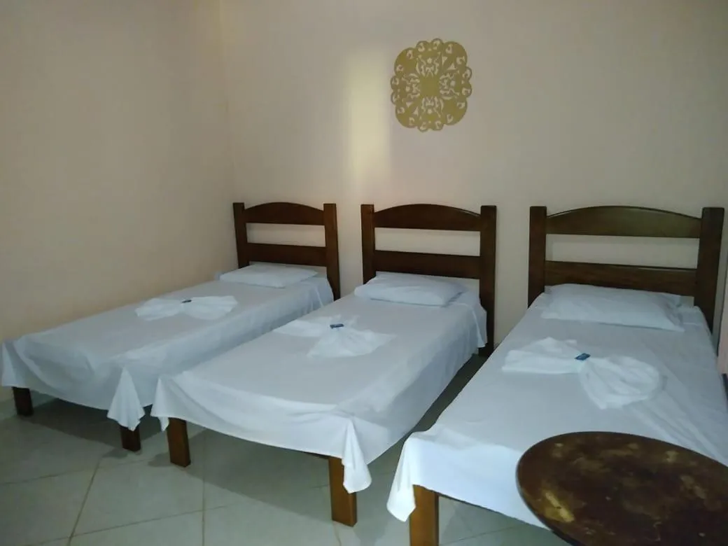 Bed in Pousada Licuri