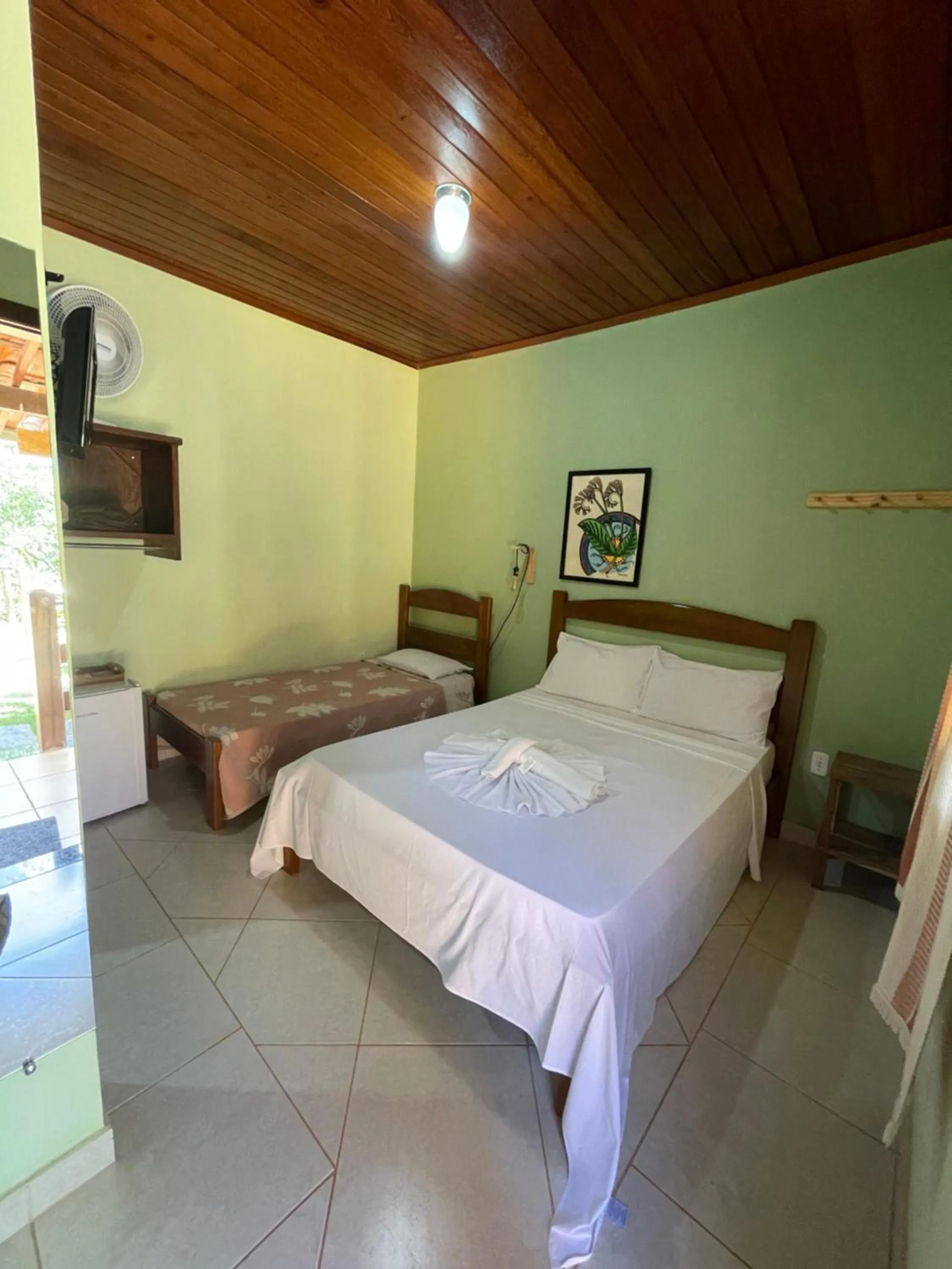 Bed in Pousada Licuri