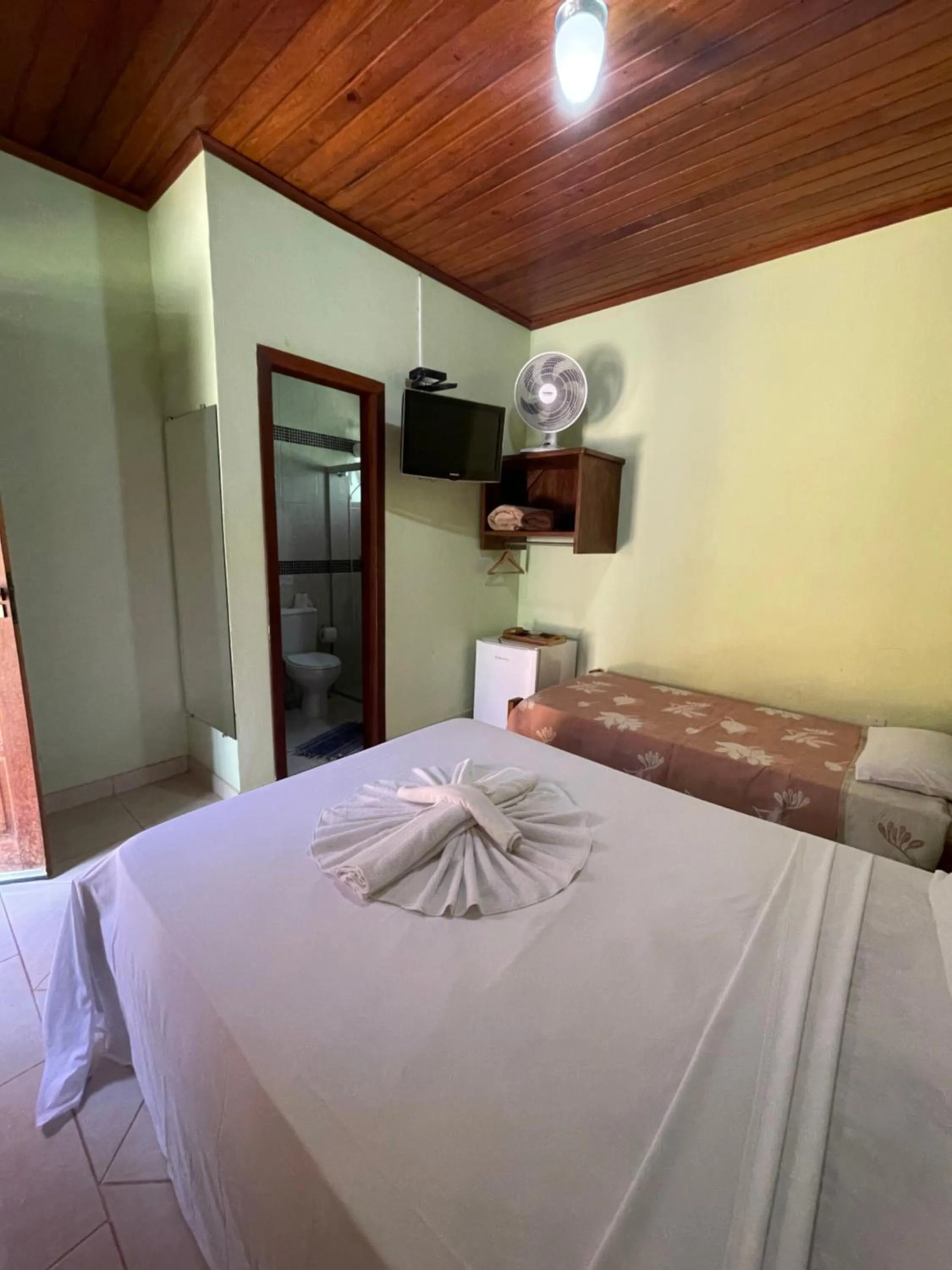 Bed in Pousada Licuri