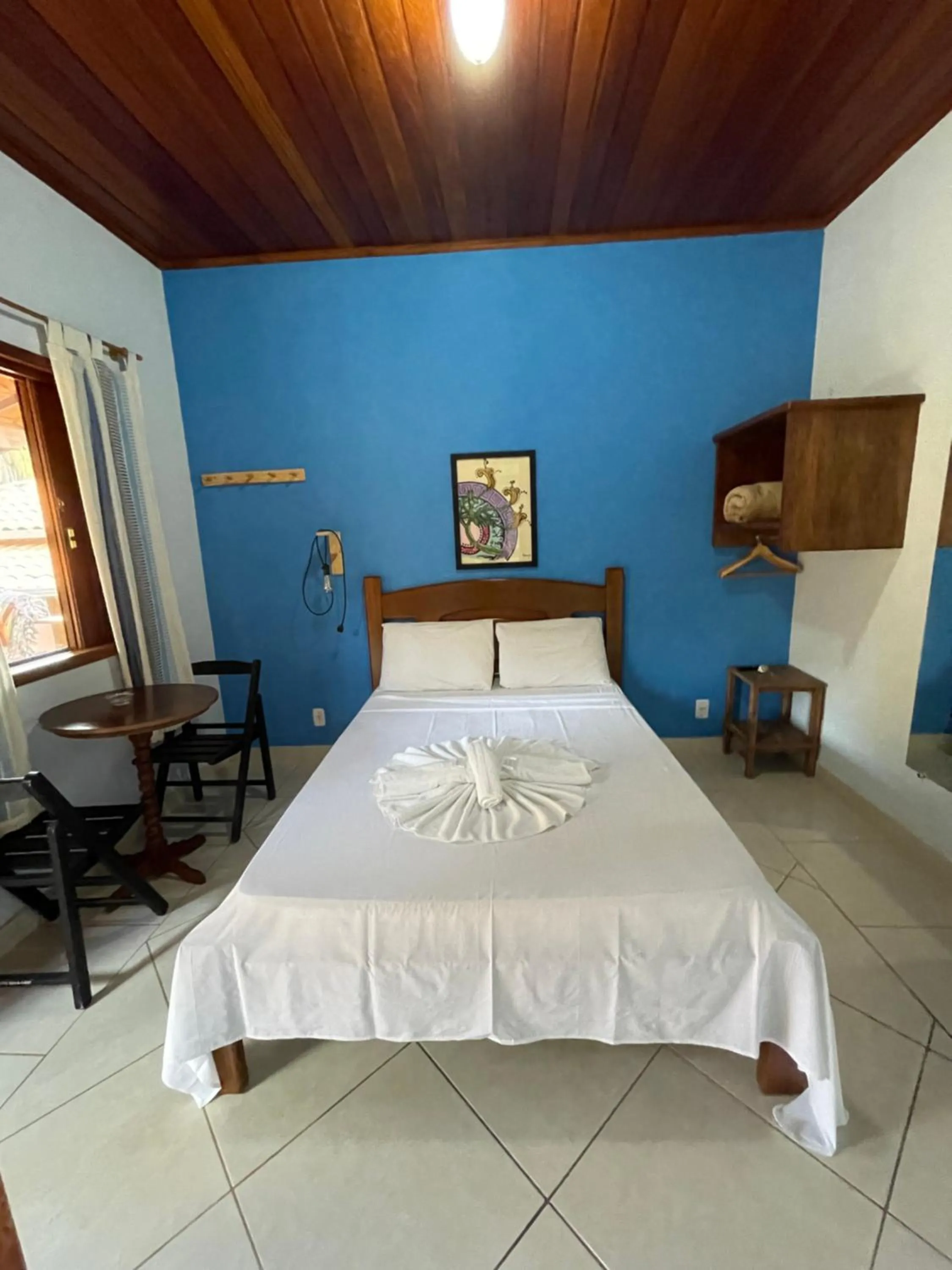 Bed in Pousada Licuri