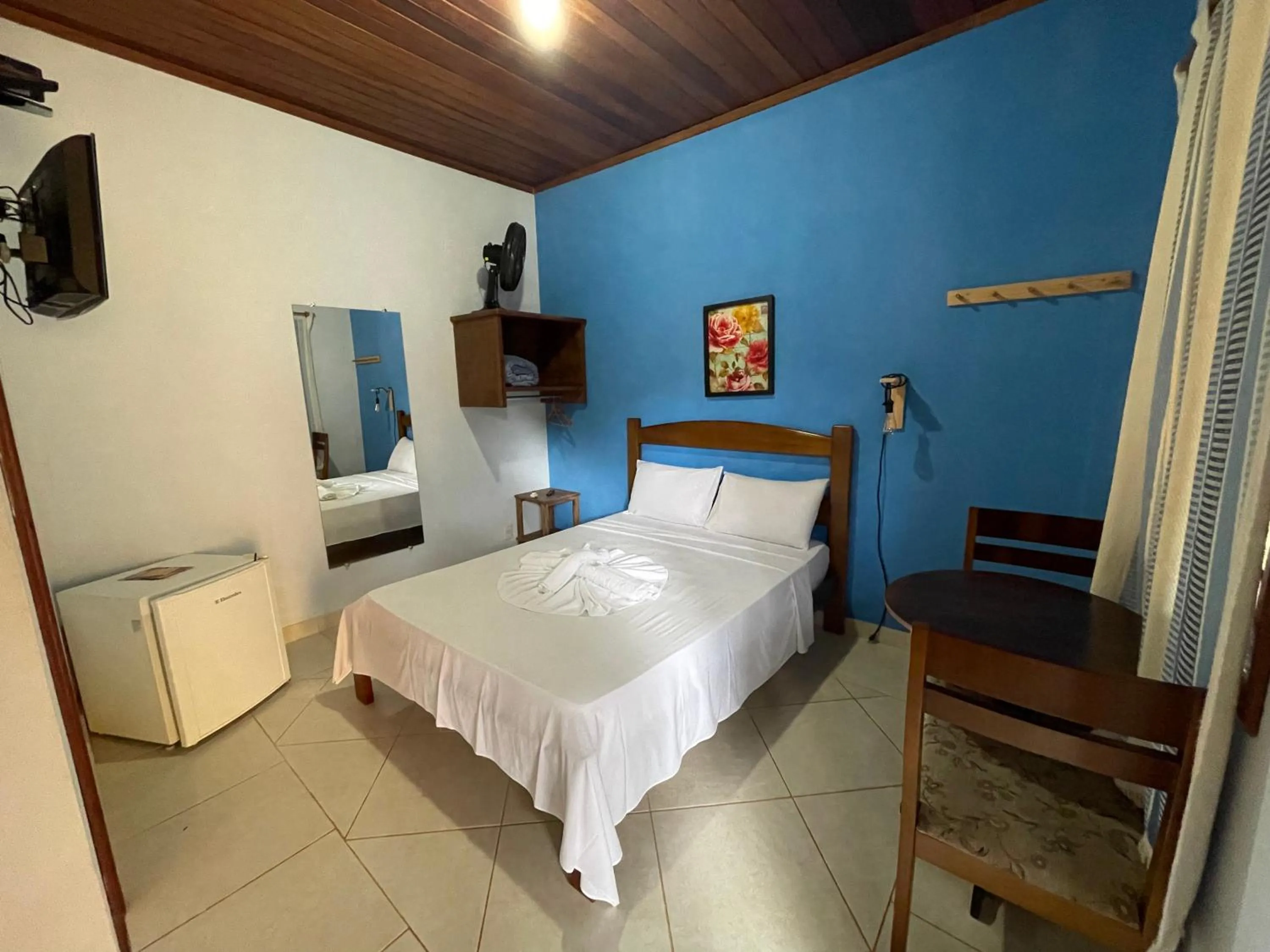 Bed in Pousada Licuri