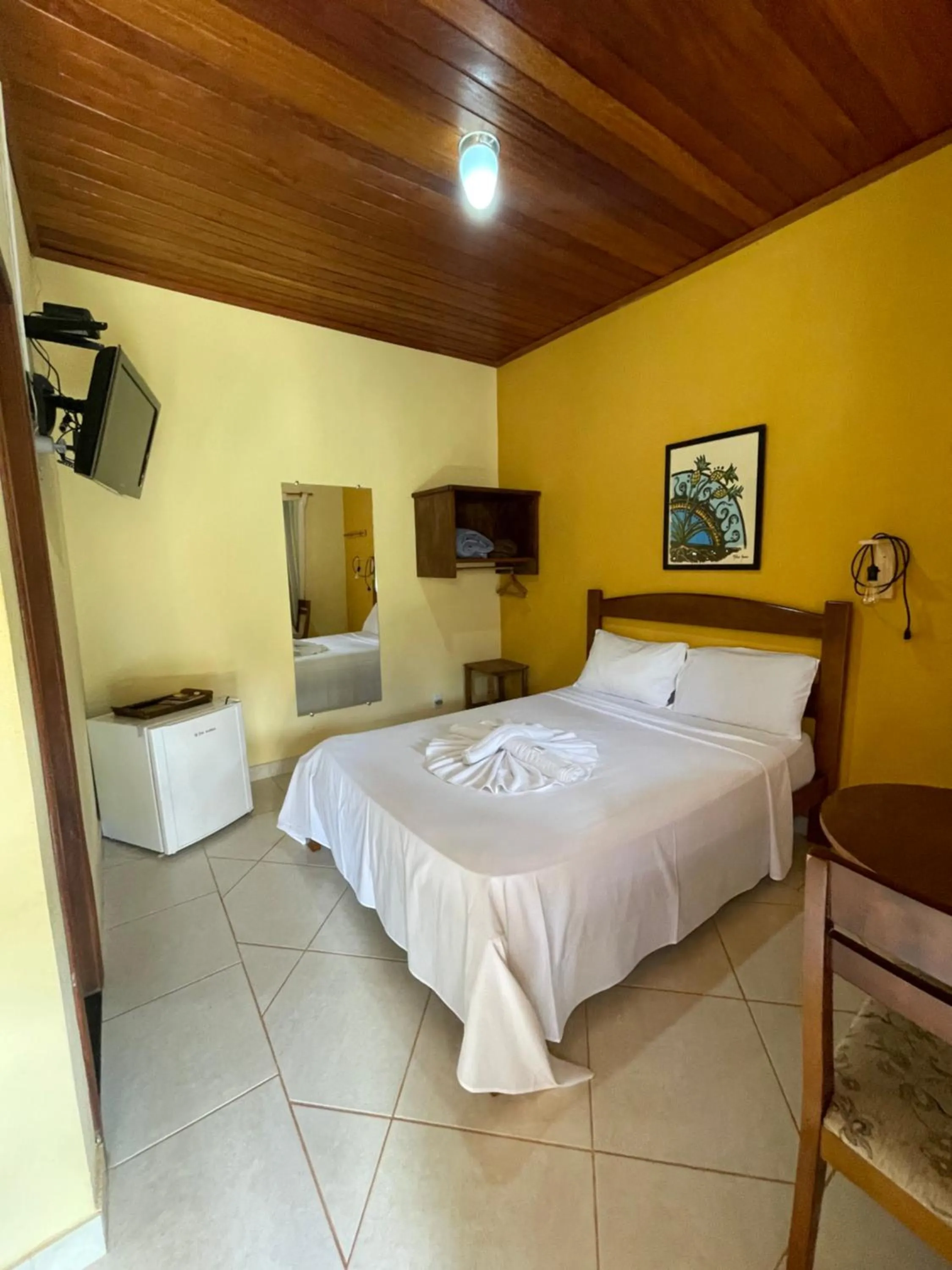 Bed in Pousada Licuri