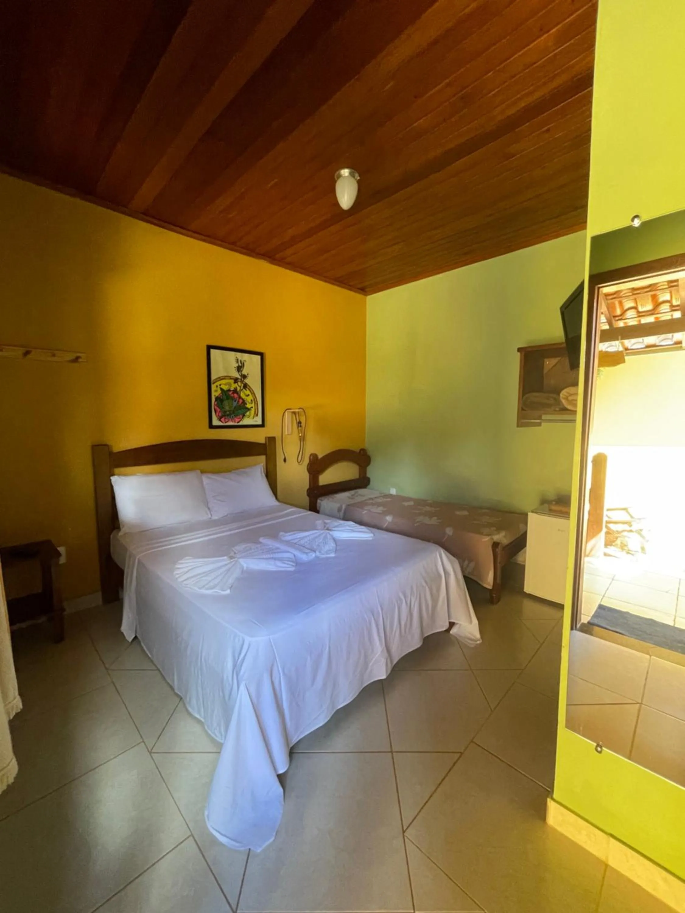 Bed in Pousada Licuri