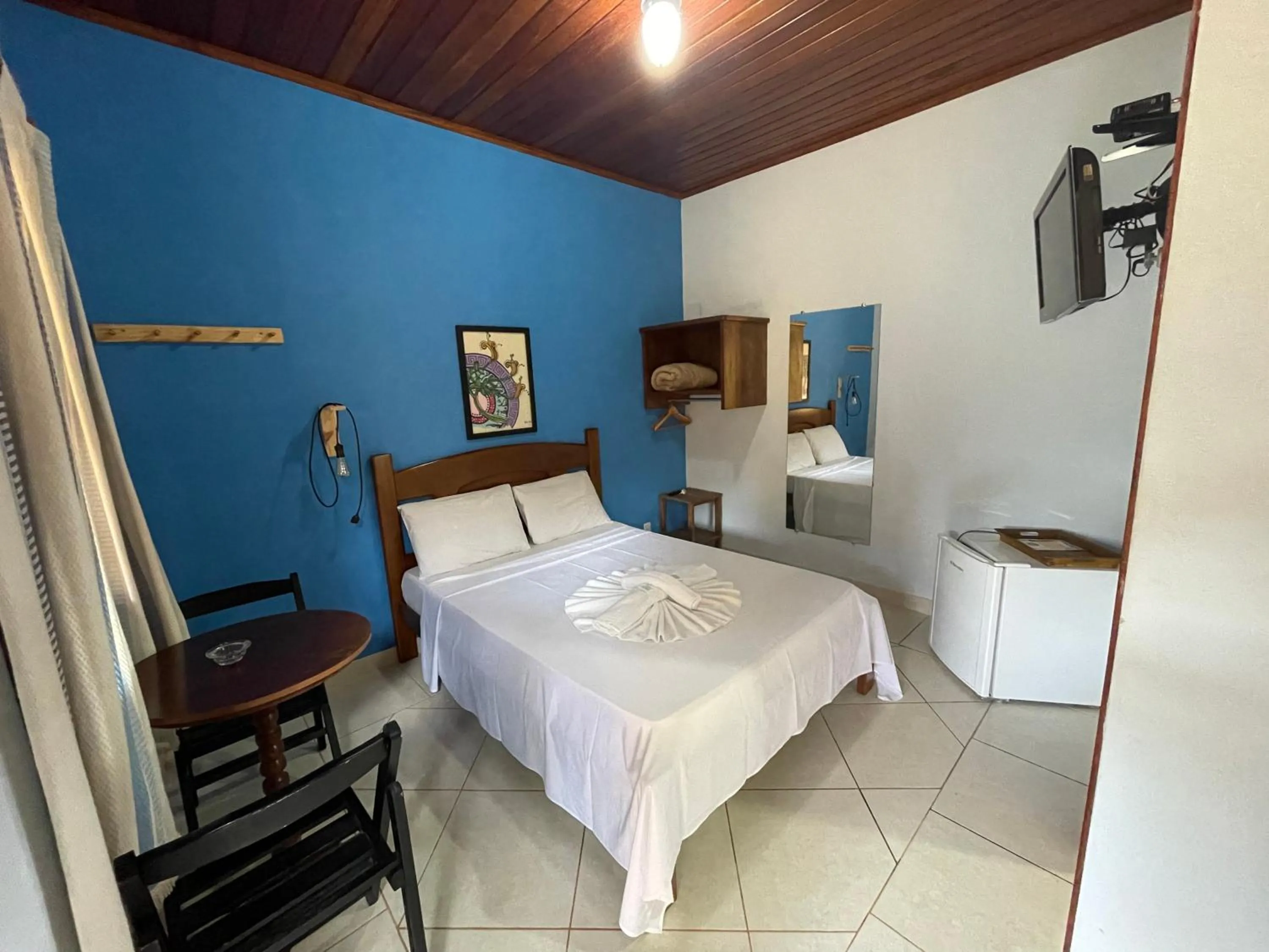 Bed in Pousada Licuri