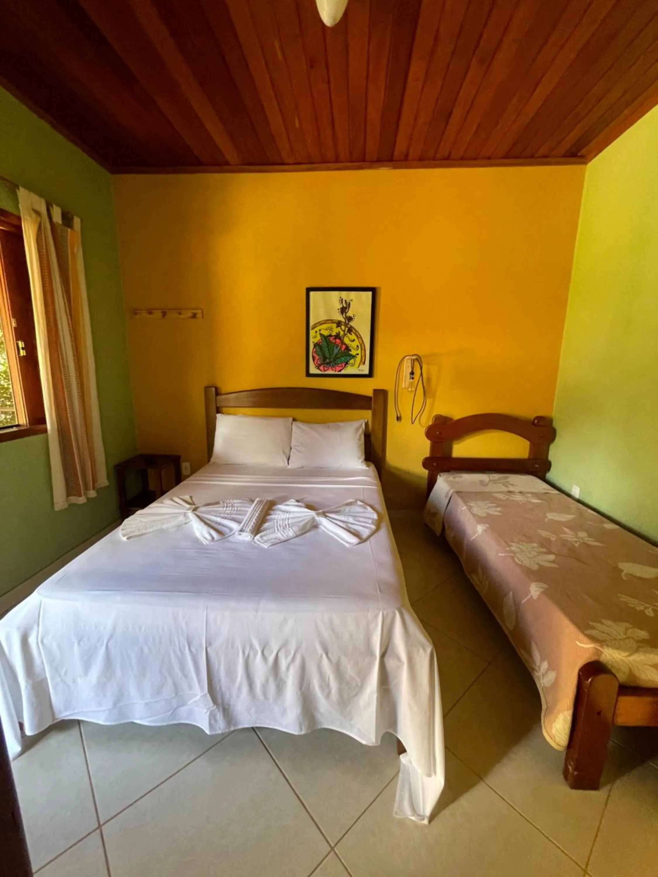 Bed in Pousada Licuri